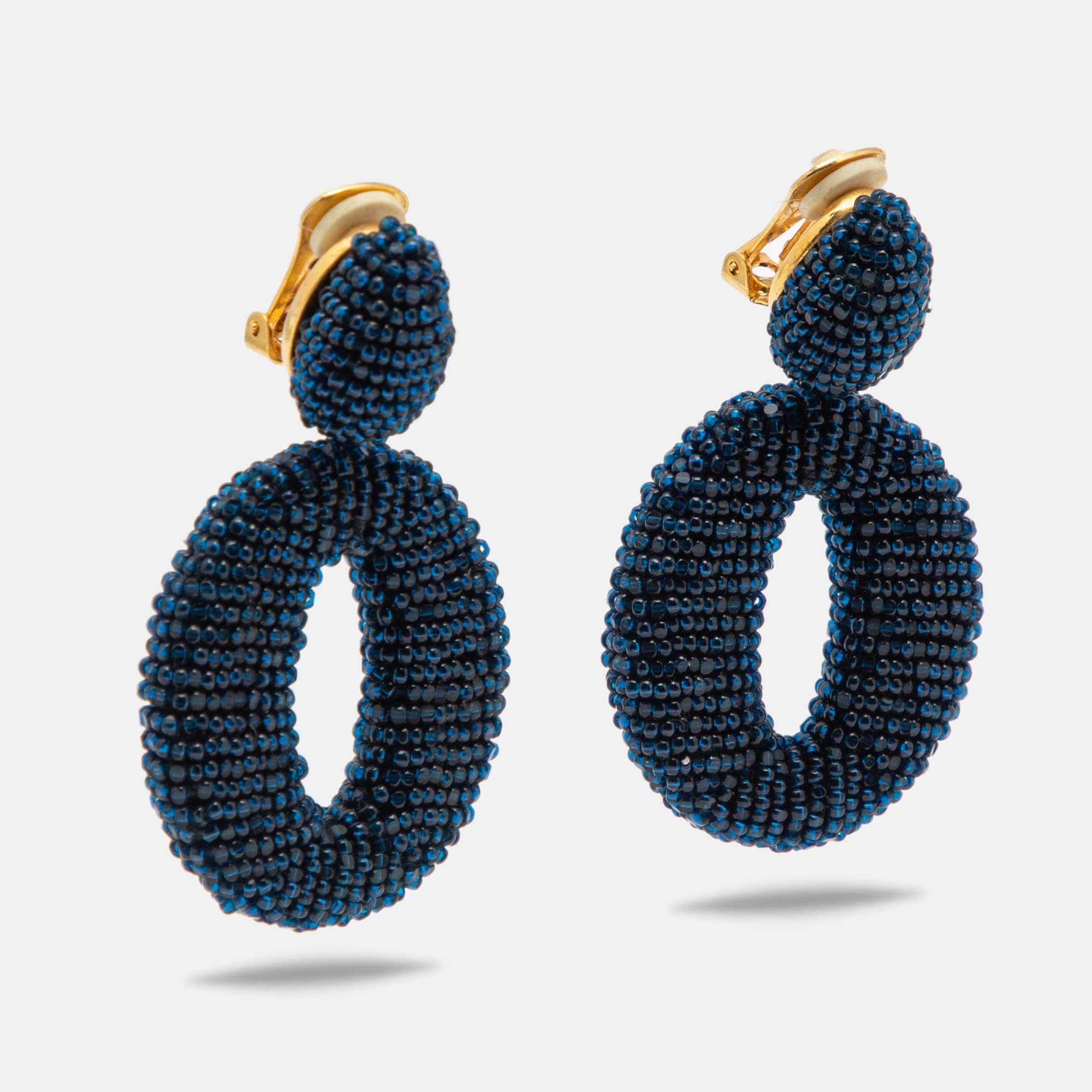 

Oscar de la Renta Oscar O Blue Beads Gold Tone Clip On Earrings