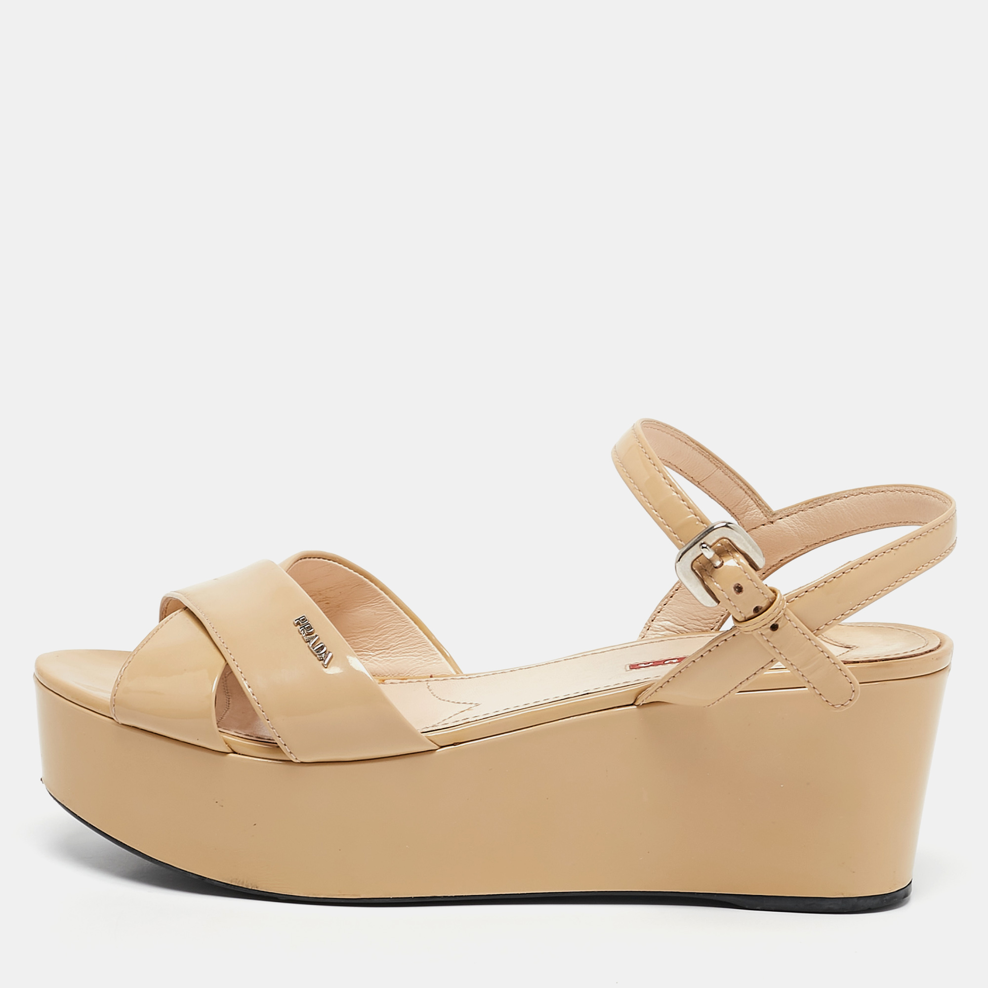 

Prada Sport Beige Patent Leather Wedge Sandals Size