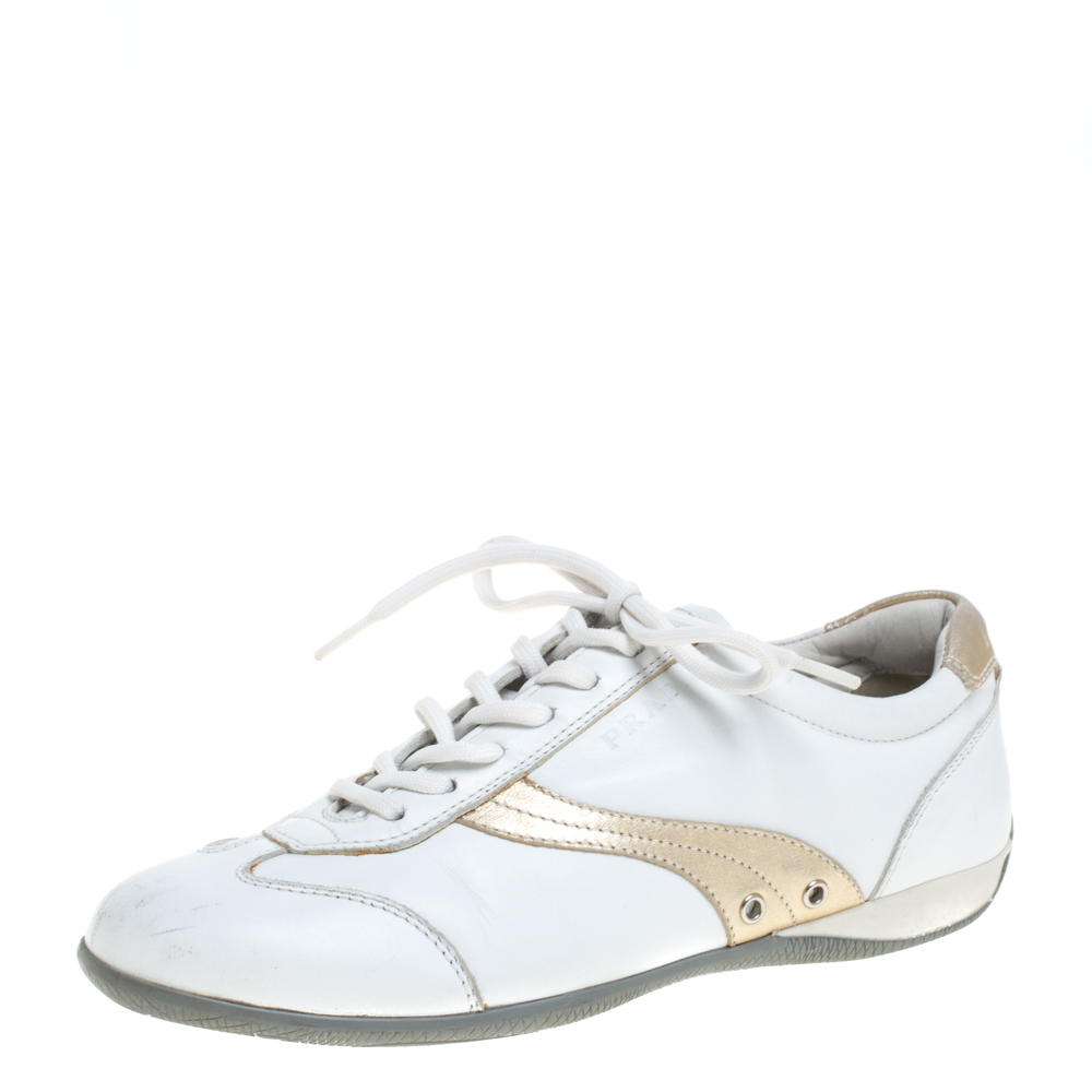 Flaunt a stylish look every time you pair an outfit with these Prada Sport sneakers. Crafted from white leather they have a low top silhouette lace ups on the vamps contrasting trims stitch detailing comfortable insoles and durable rubber soles. Grab them now