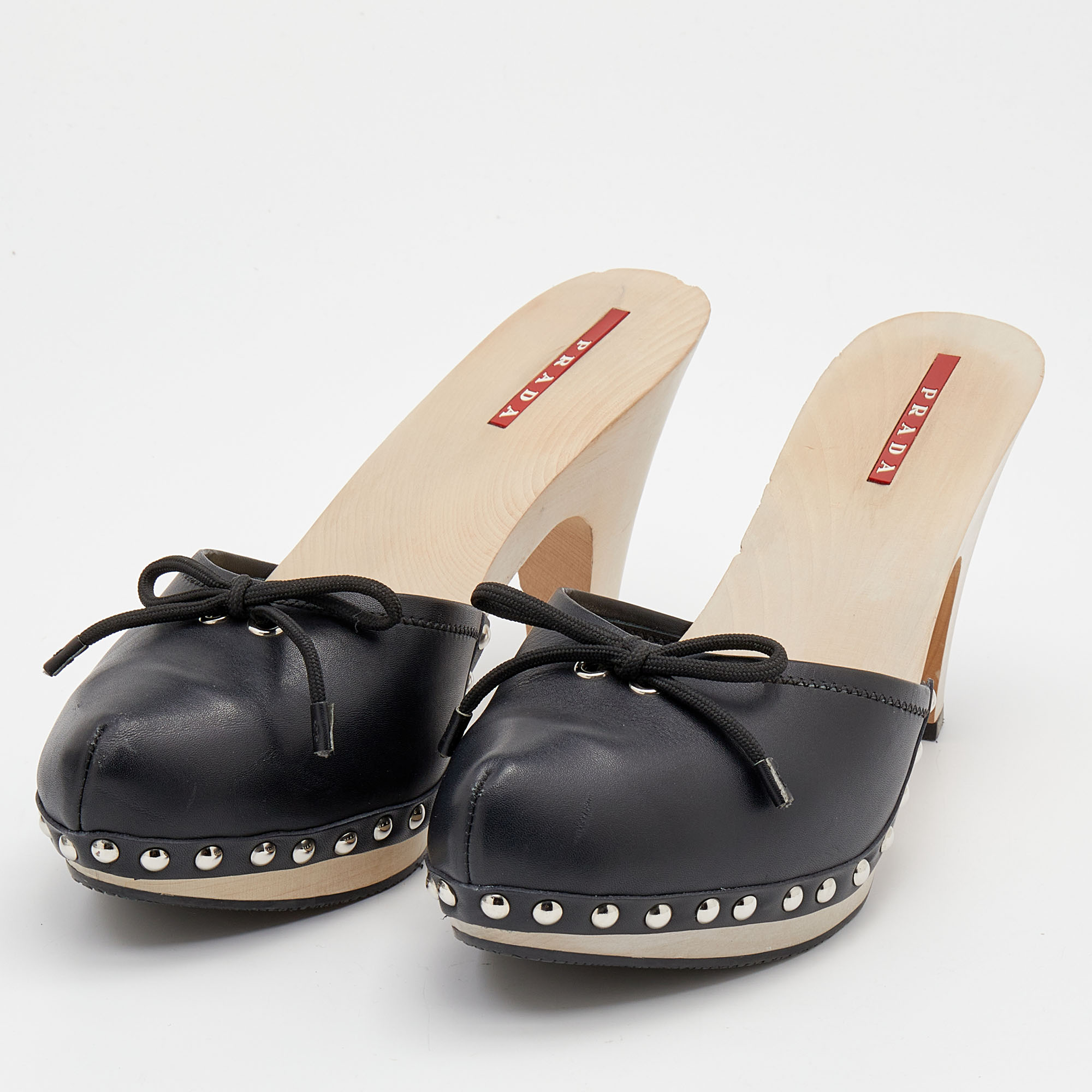 

Prada Sport Black Leather Bow Wooden Clogs Size
