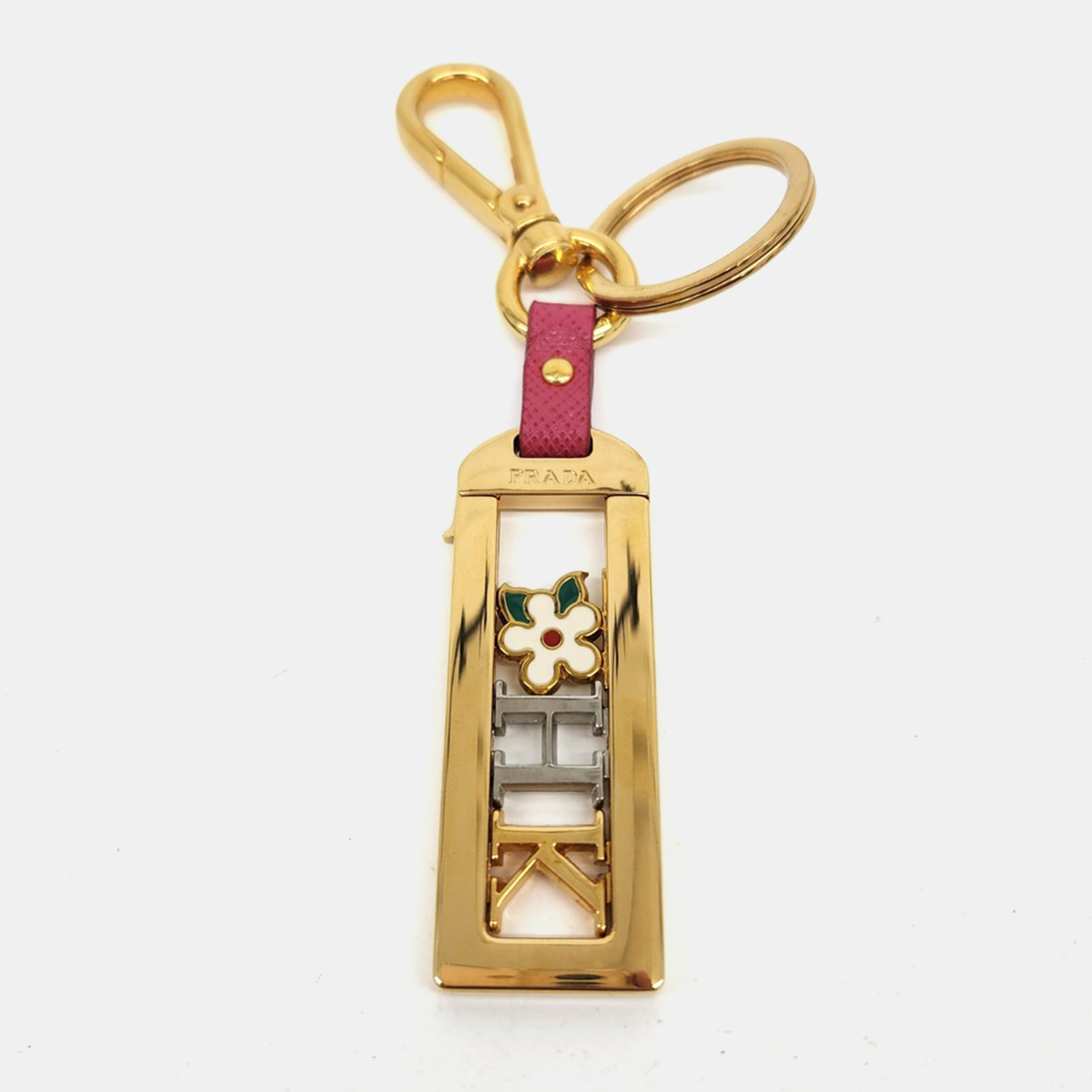 Click to view more detailed imagery on our partner's website Pre-owned Prada Gold Plated My Character Name Tag Keychain + Charm