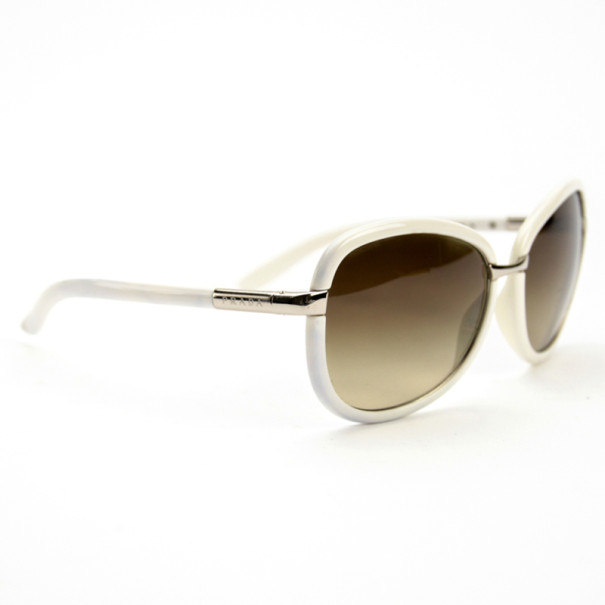 مملوكة مسبقًا Prada Cream Round Woman Sunglasses