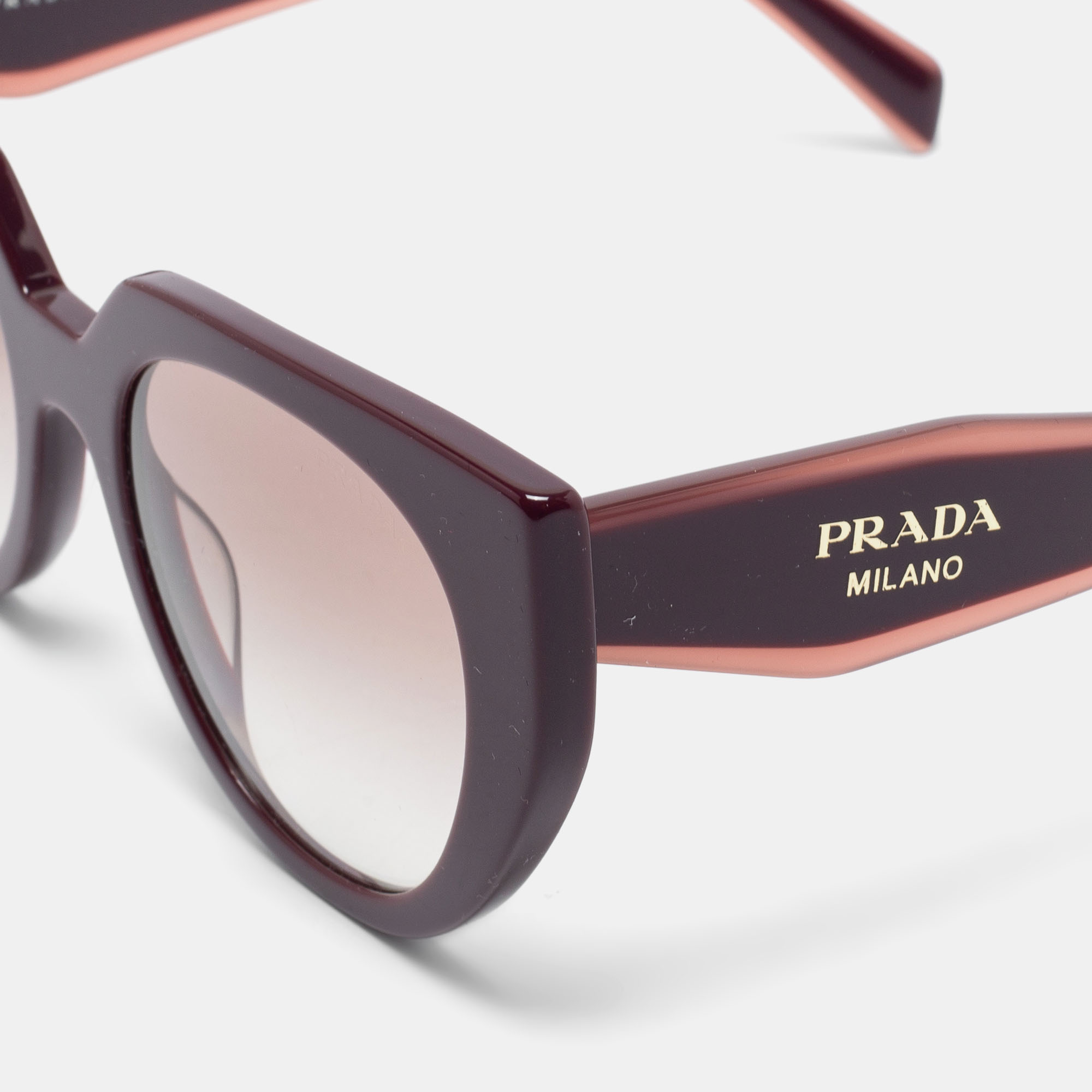 

Prada Garnet / Brown Gradient SPR 14W Cat Eye Sunglasses