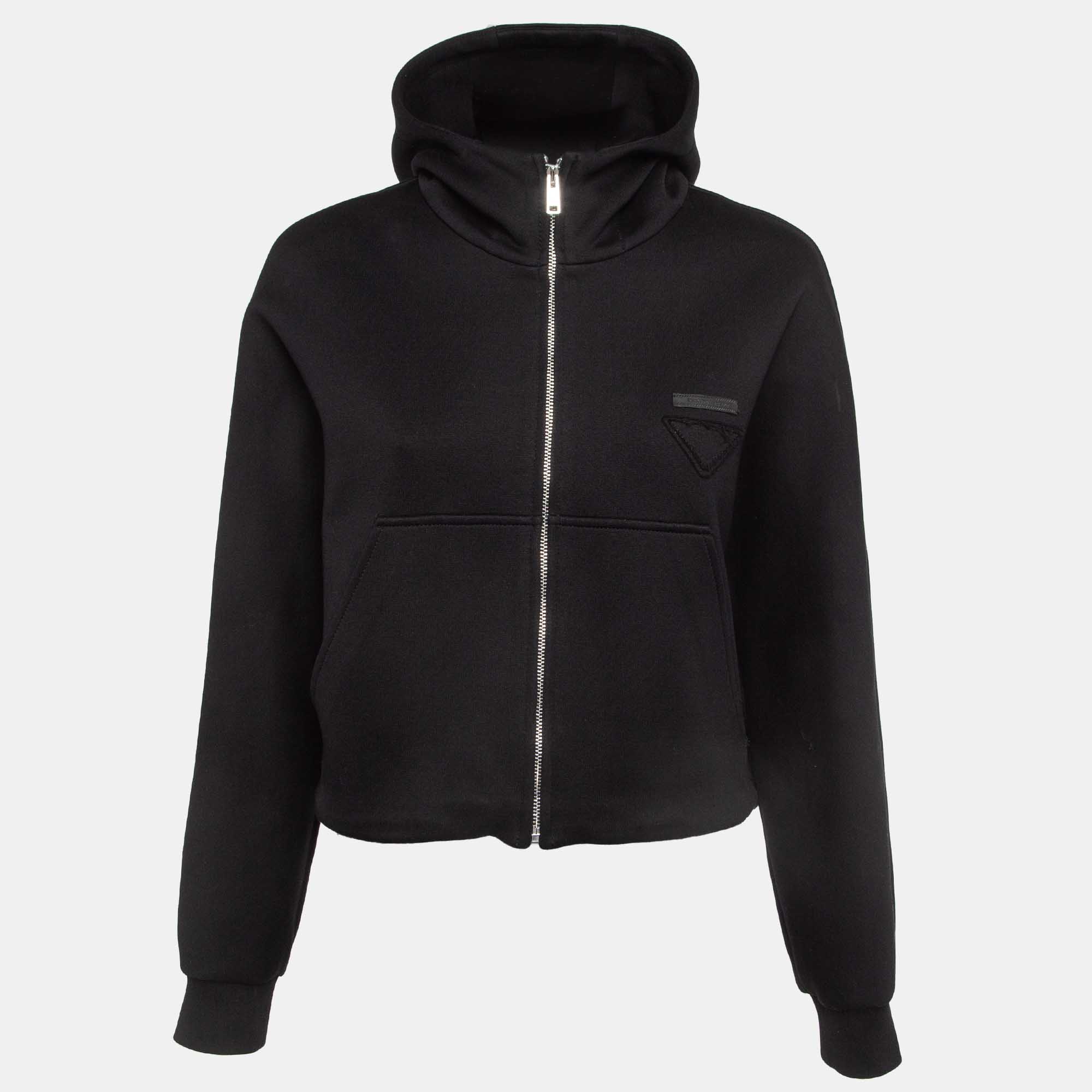 This Prada black hoodie for women is all about sporting a classy and comfy style. It is tailored from soft fabric and has signature accents.