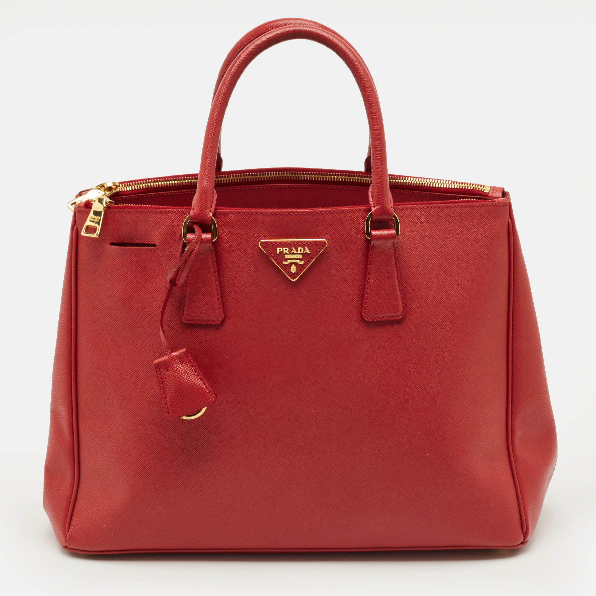 Click to view more detailed imagery on our partner's website Pre-owned Prada Double Zip Large Red Saffiano Leather Tote
