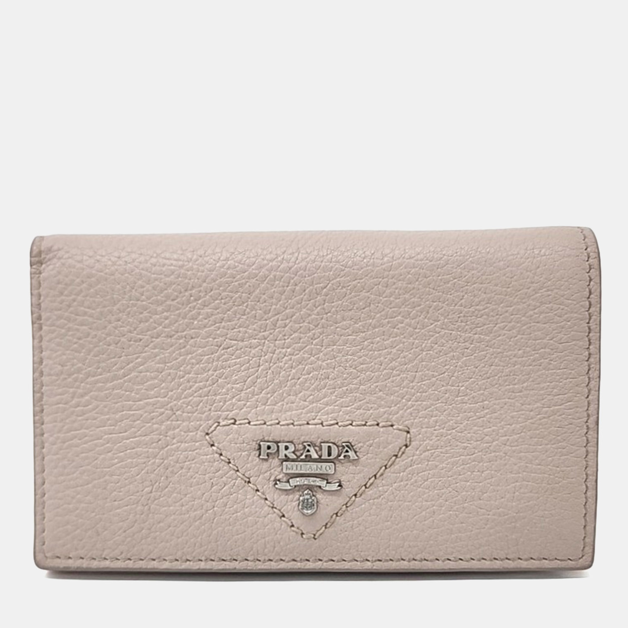 

Prada Beige Leather half wallet