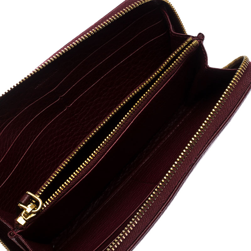

Prada Burgundy Leather Zip Around Continental Wallet