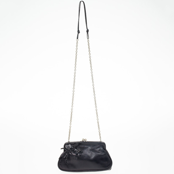 prada kiss lock bag