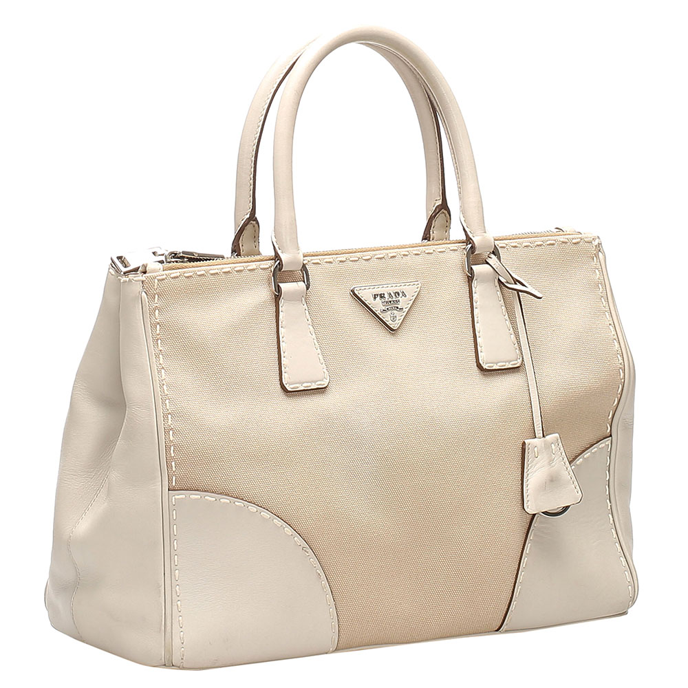 

Prada Beige Leather-trimmed Canapa Canvas City Stitch Double Zip Bag