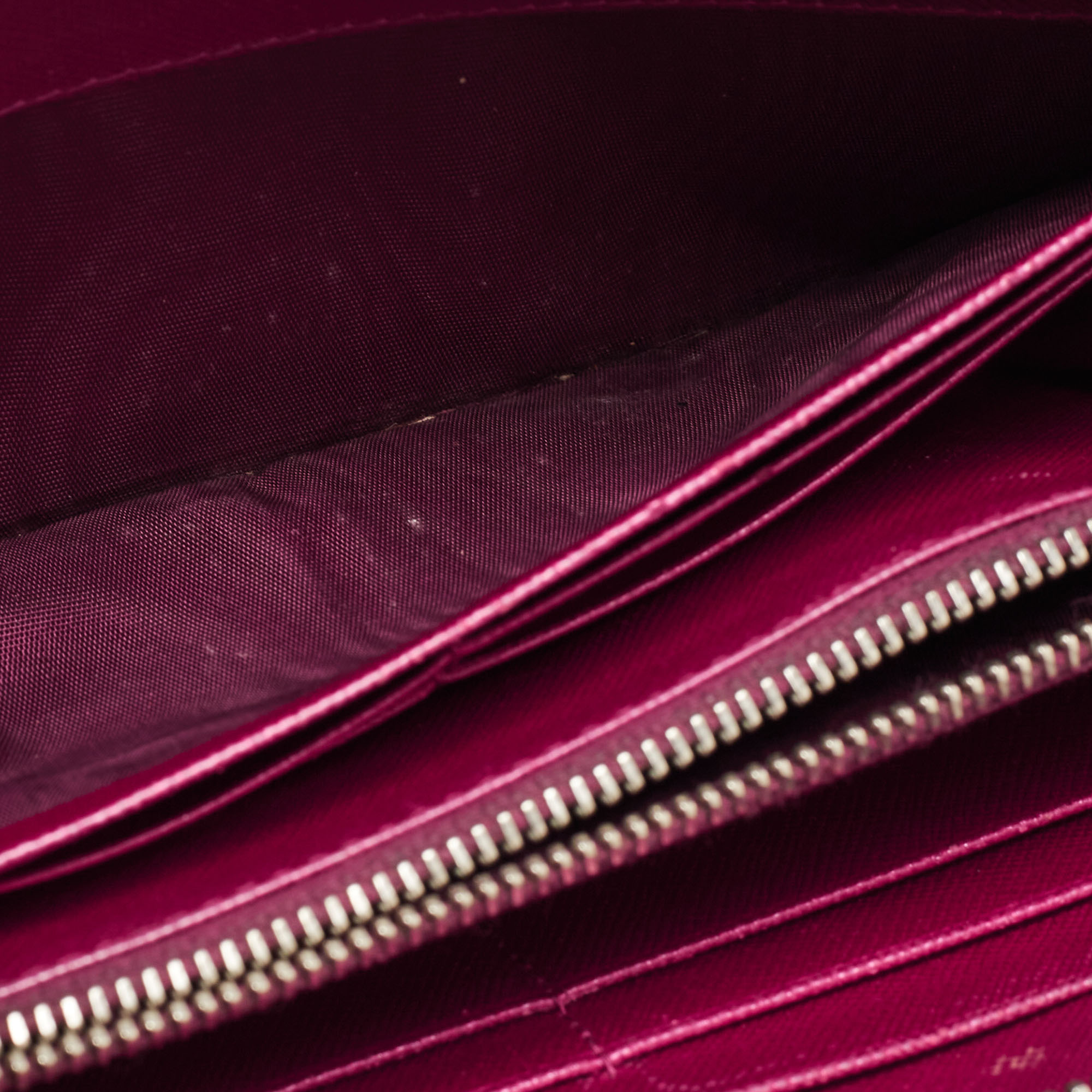 

Prada Metallic Magenta Saffiano Metal Leather Zip Around Wallet