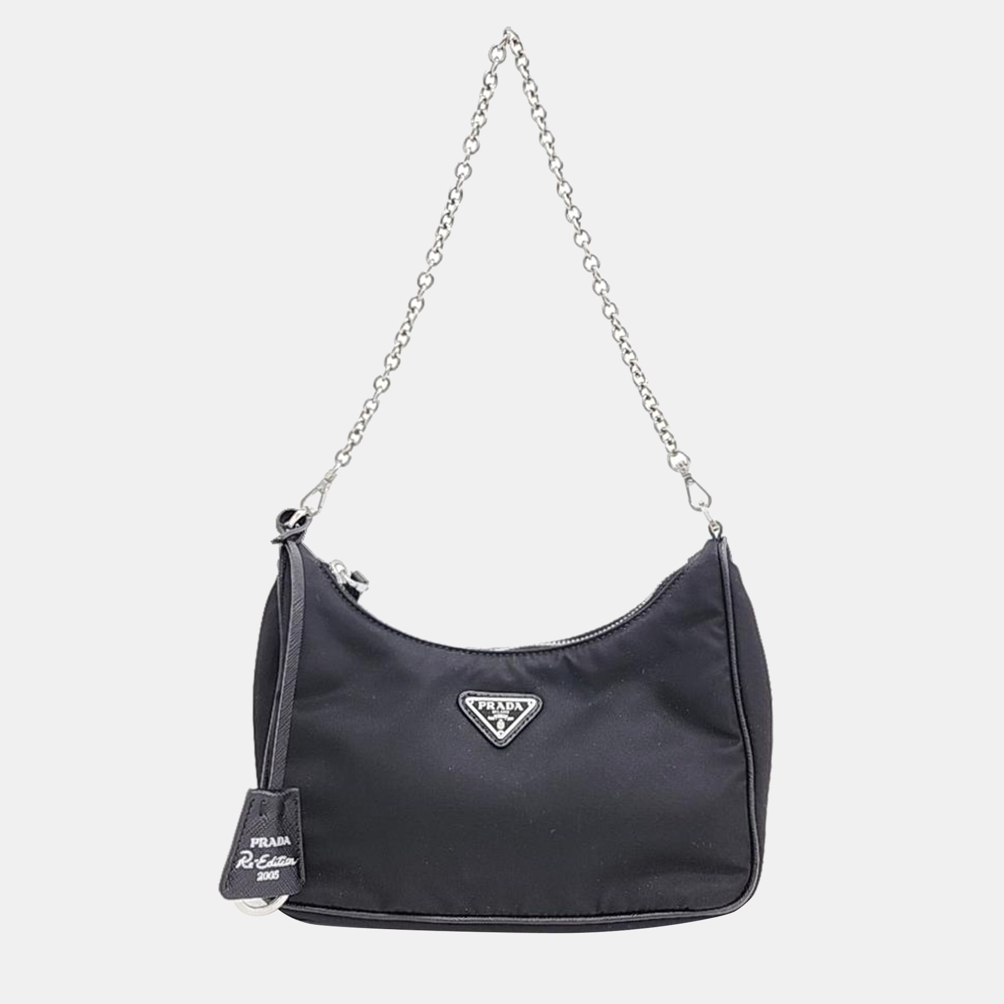 Elevate your style with this Prada hobo bag. Merging form and function this exquisite accessory epitomizes sophistication ensuring you stand out with elegance and practicality by your side