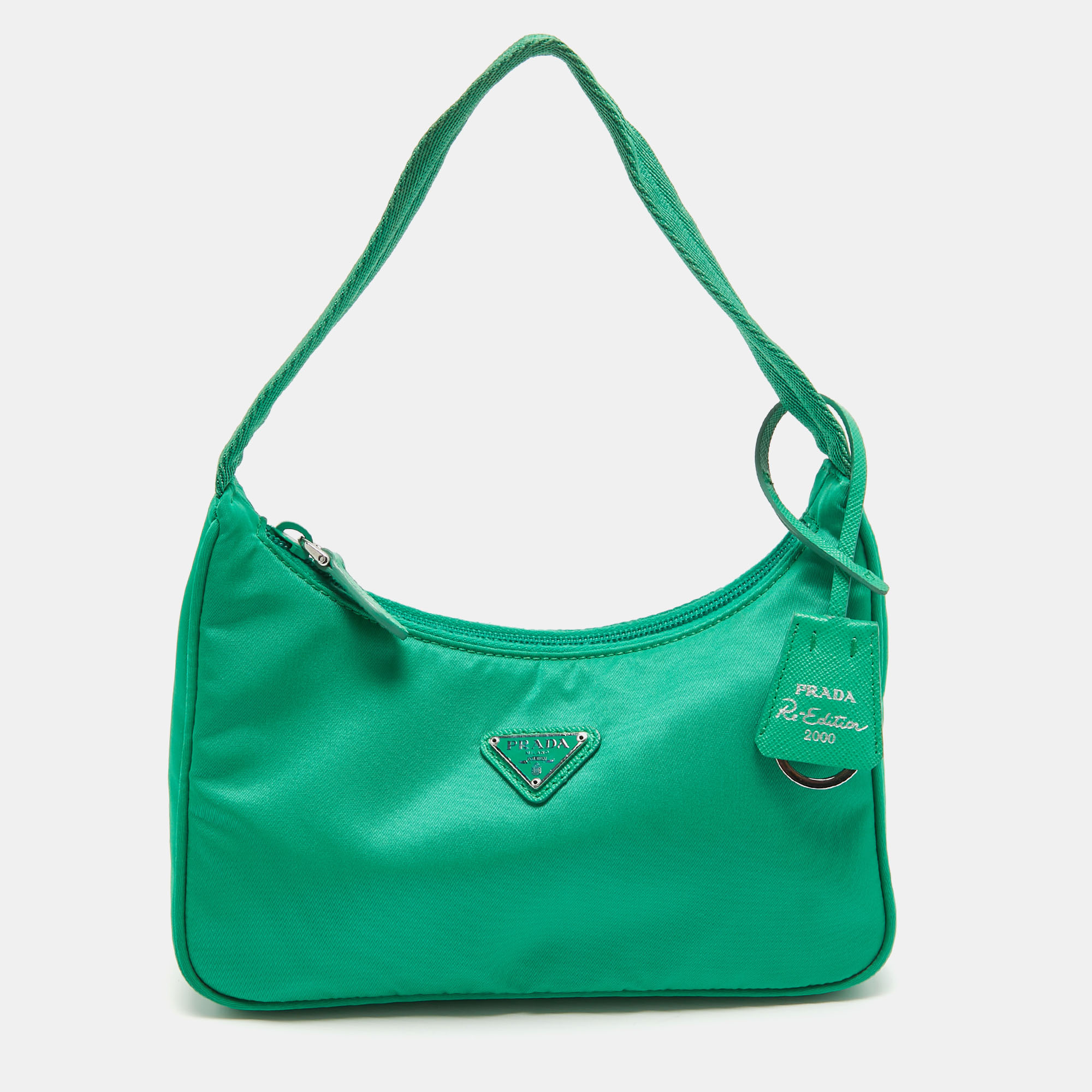 Ensure your days essentials are in order and your outfit is complete with this Prada green bag. Crafted using the best materials the bag carries the maisons signature of artful craftsmanship and enduring appeal.