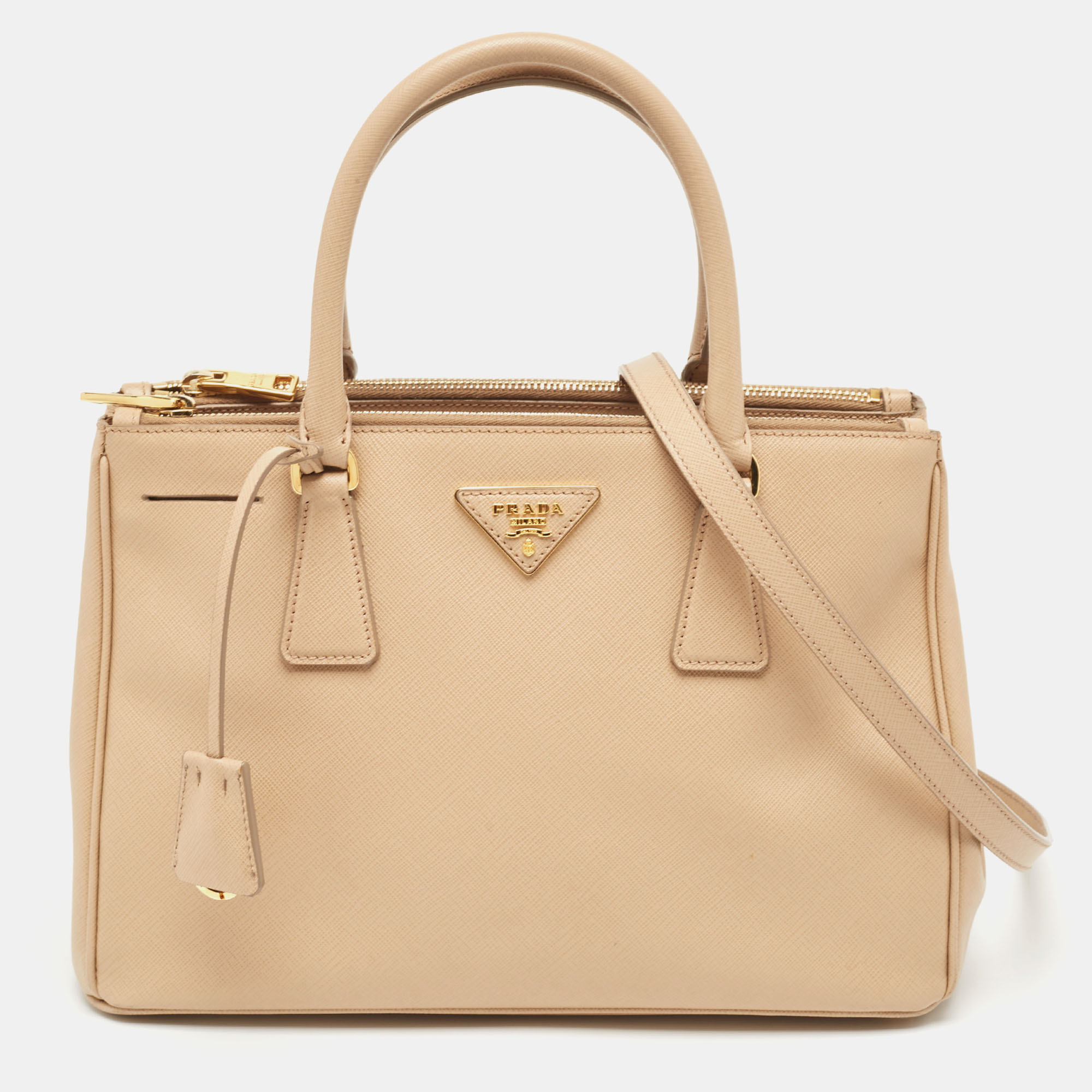 Thoughtful details high quality and everyday convenience mark this designer bag for women by Prada. The bag is sewn with skill to deliver a refined look and an impeccable finish.
