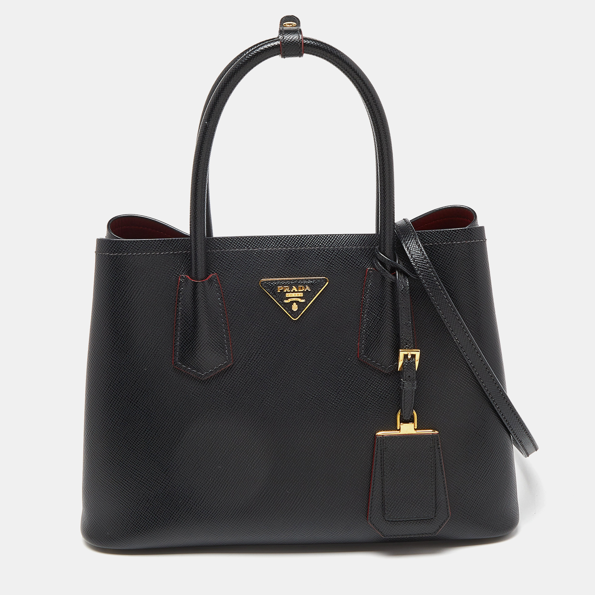Indulge in luxury with this Prada bag. Meticulously crafted from premium materials it combines exquisite design impeccable craftsmanship and timeless elegance. Elevate your style with this fashion accessory.