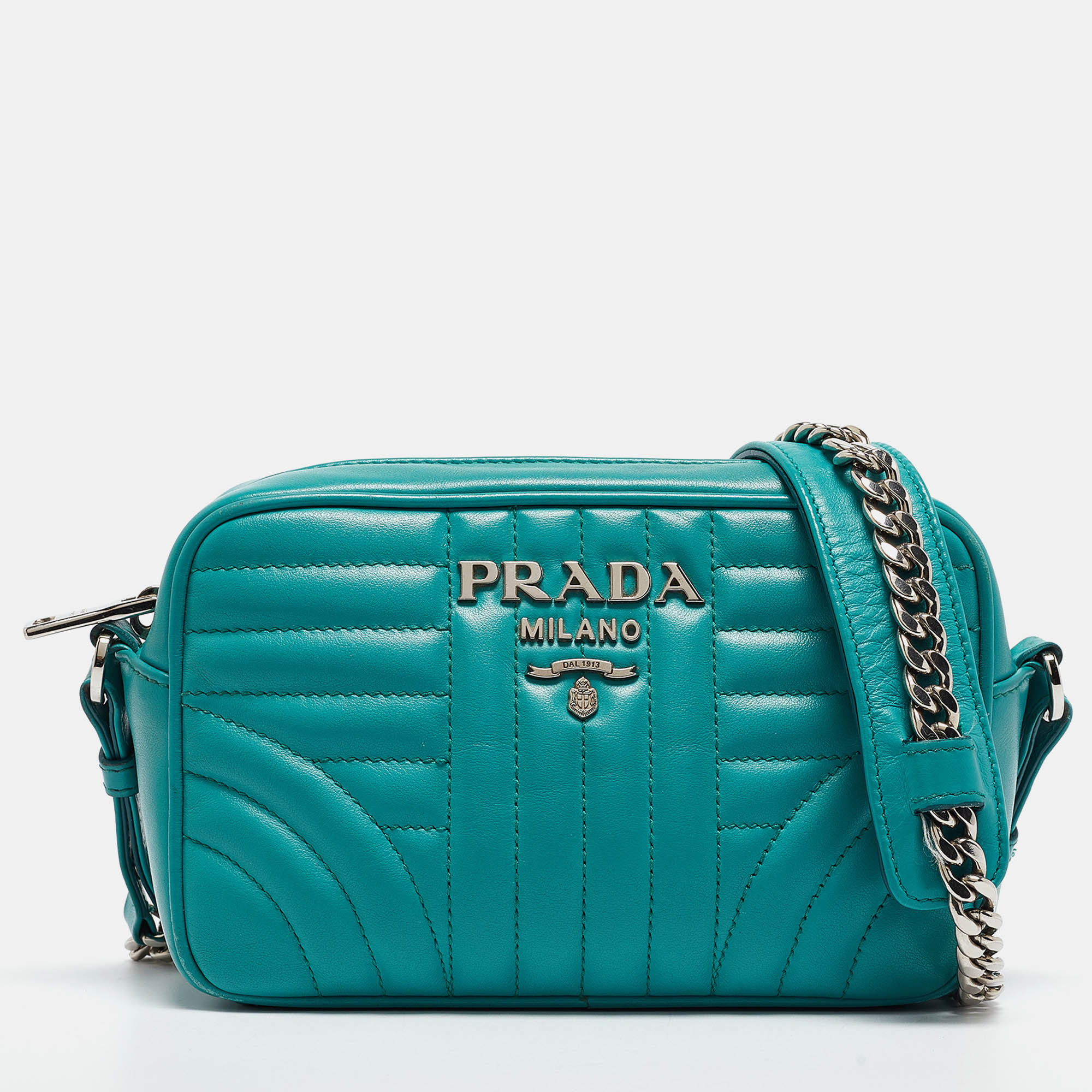 Ensure your days essentials are in order and your outfit is complete with this Prada green shoulder bag. Crafted using the best materials the bag carries the maisons signature of artful craftsmanship and enduring appeal.