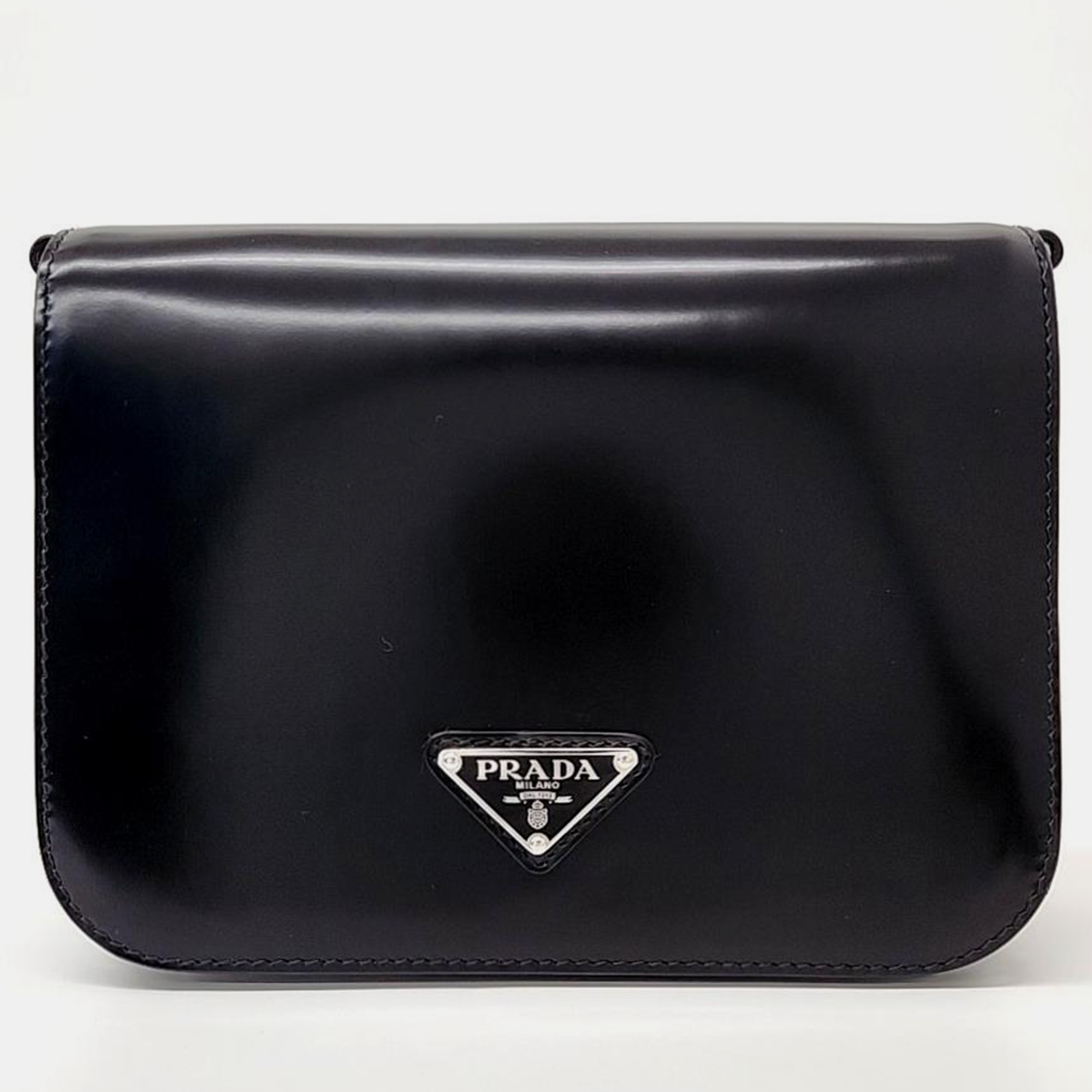 This elegant Prada bag is perfect to enhance your everyday style. It is carefully sewn and finished to be a wonderful investment in your closet.