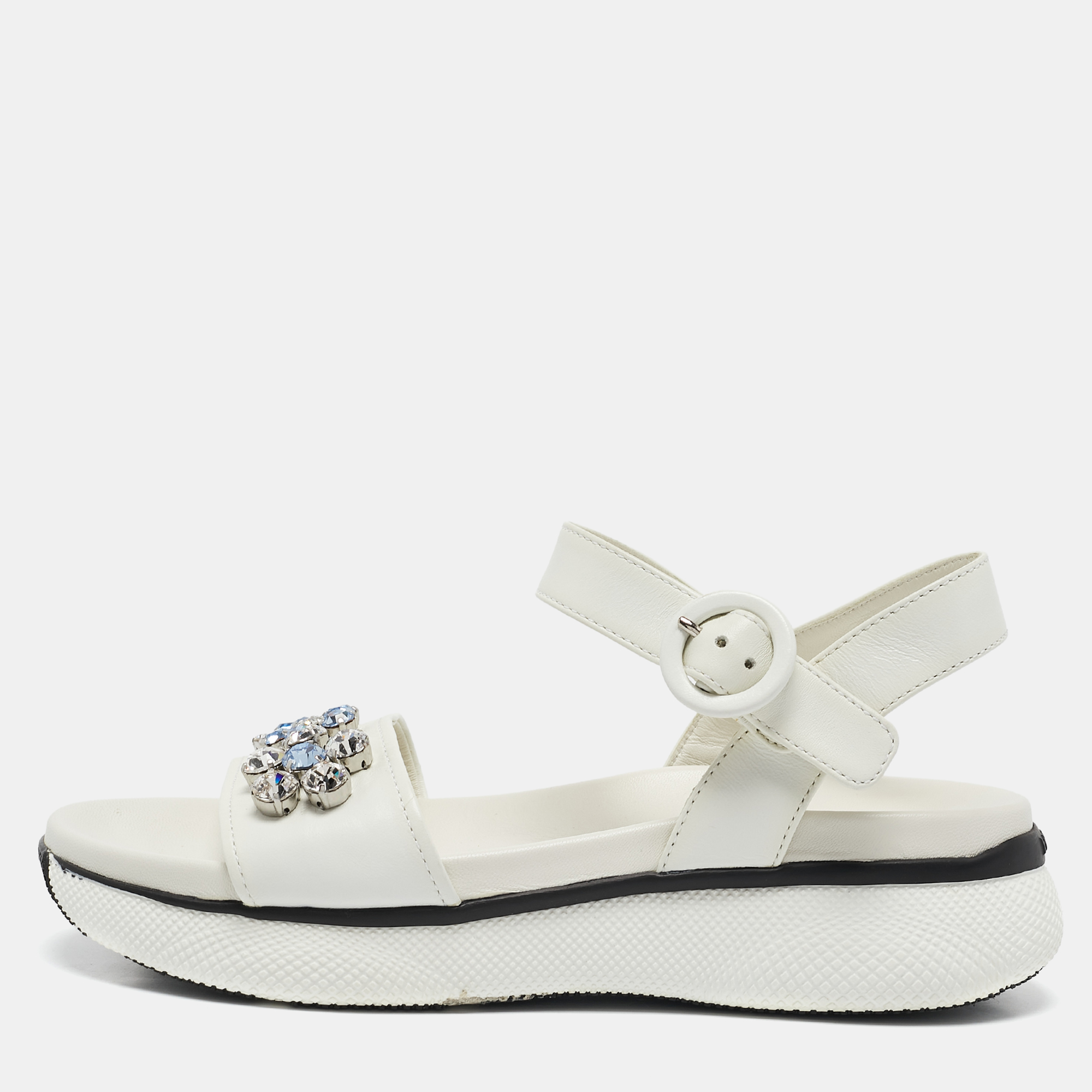 

Prada White Leather Stud Embellished Ankle Strap Flat Sandal Size