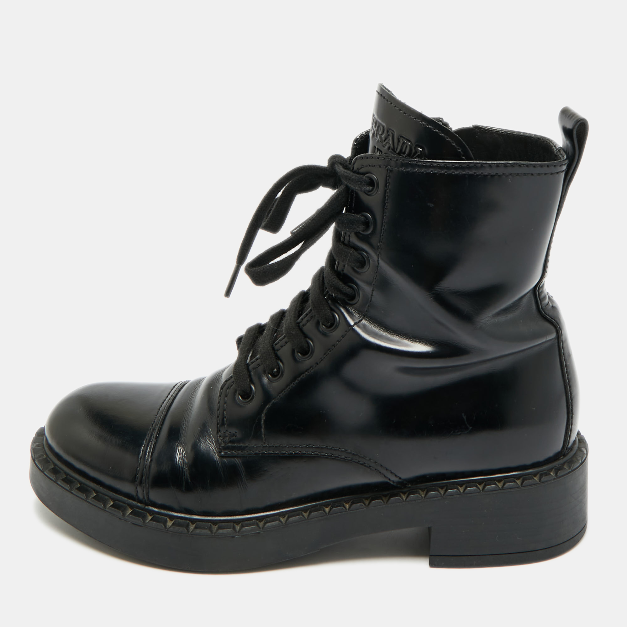 Click to view more detailed imagery on our partner's website Pre-owned Prada Size 37.5 Black Leather Combat Boots