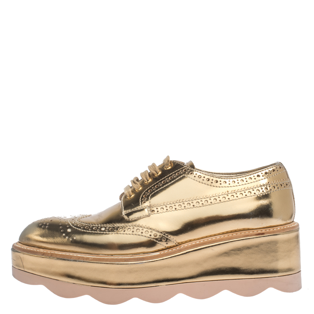 

Prada Metallic Gold Brogue Leather Wave Wingtip Platform Derby Sneakers Size