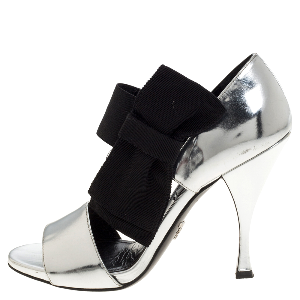 

Prada Metallic Silver Leather Bow Embellished Elastic Strap Sandals Size