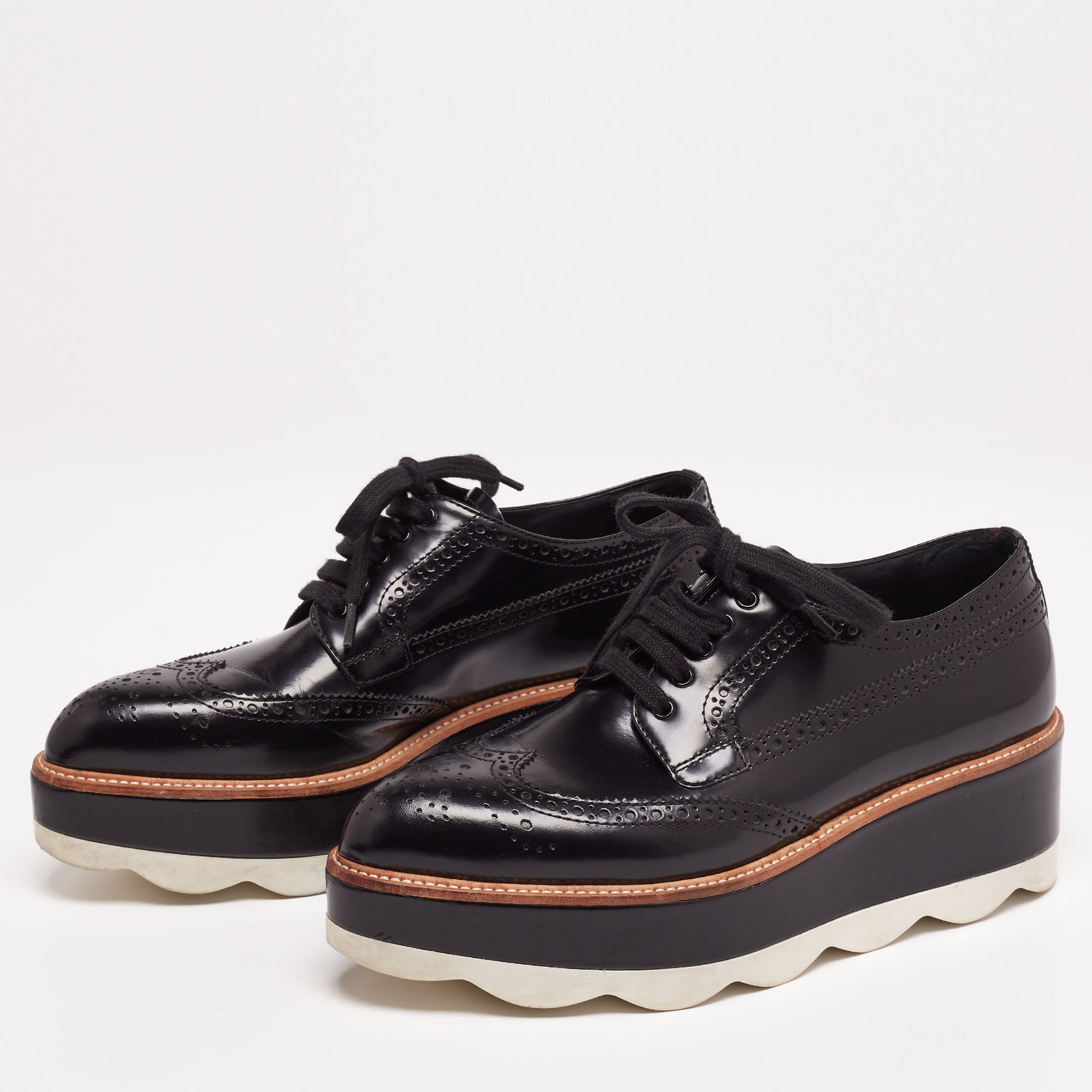 

Prada Black Brogue Patent Leather Wave Wingtip Platform Derby Sneakers Size
