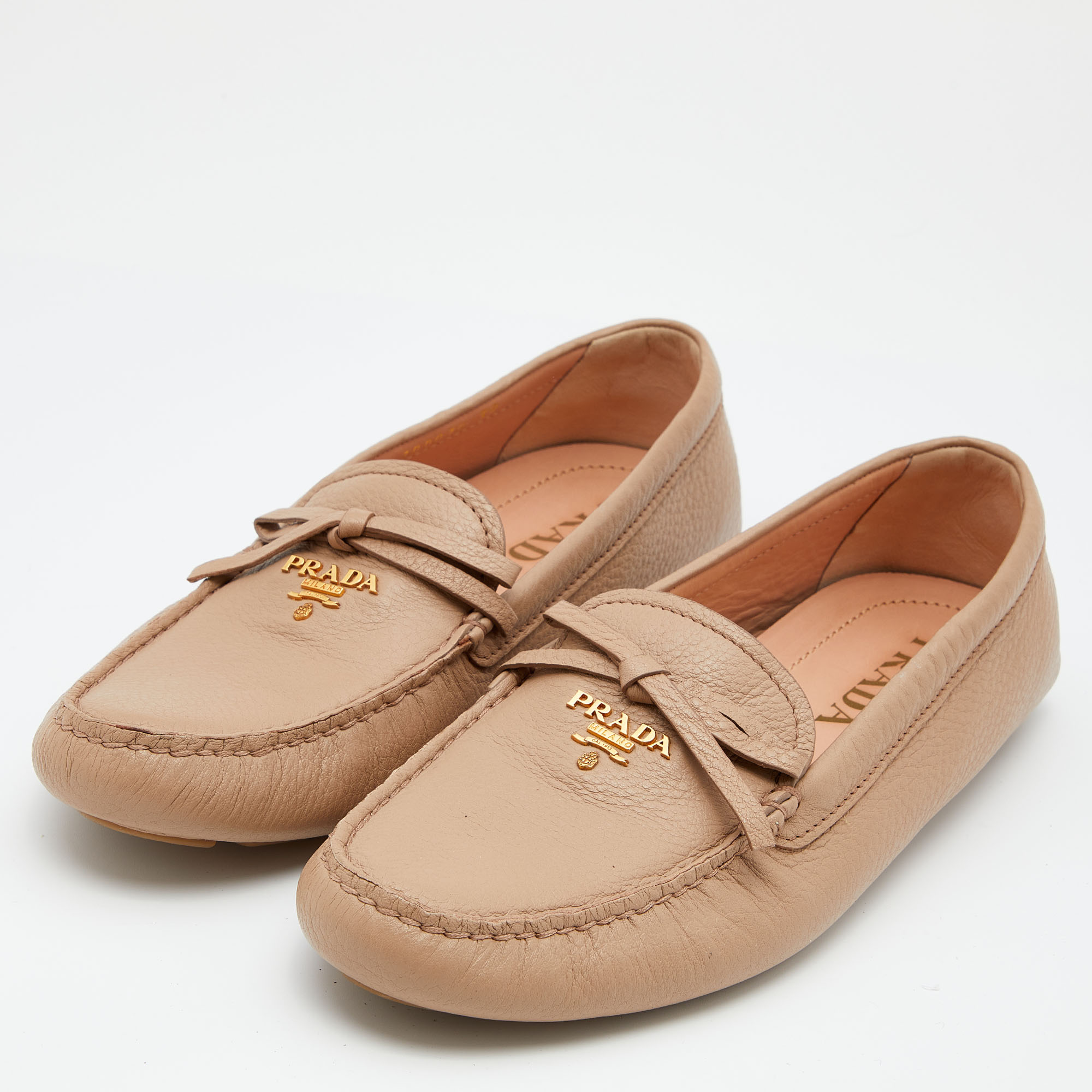

Prada Beige Leather Bow Slip on Loafers Size