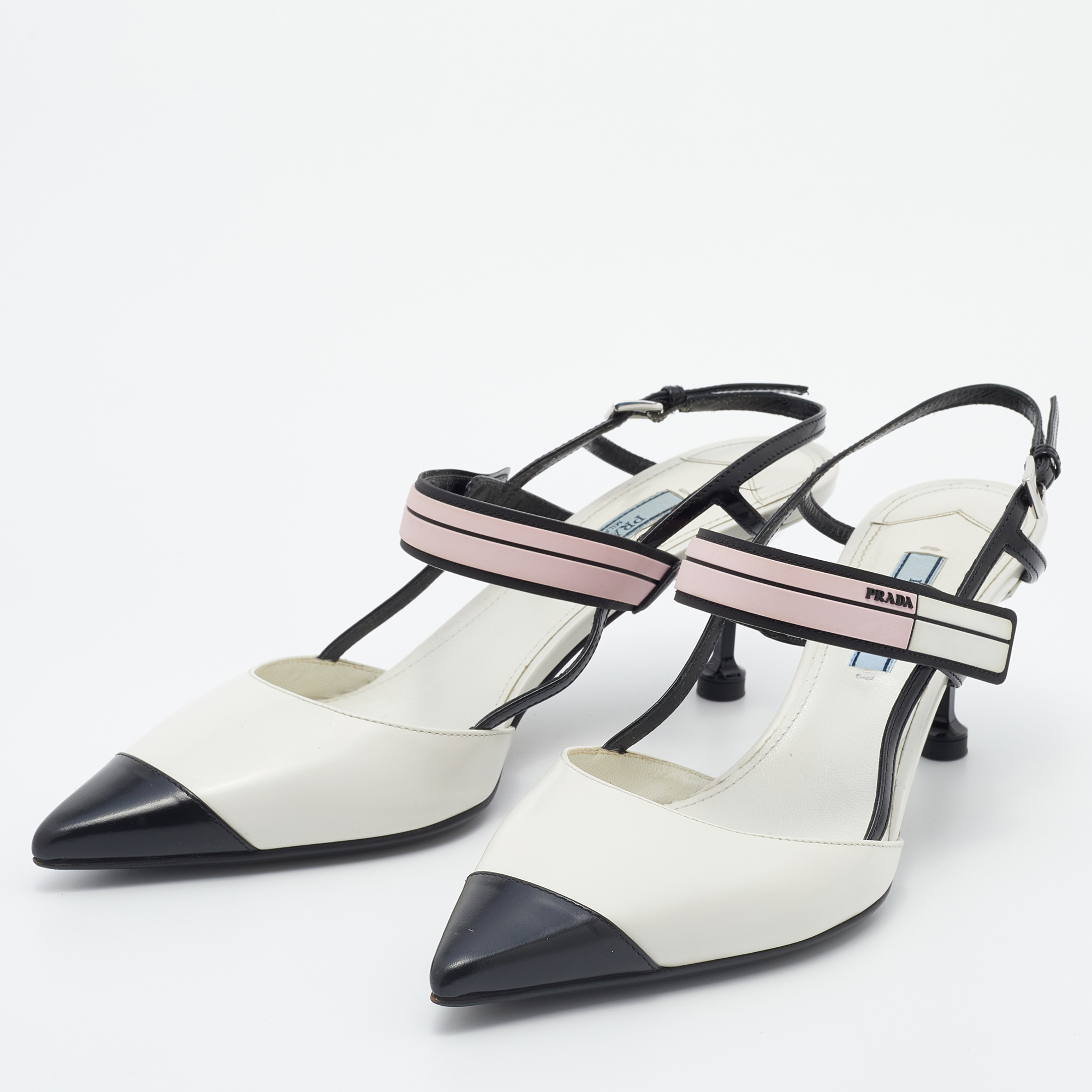 

Prada White/Black Leather and Rubber Slingback Pumps Size