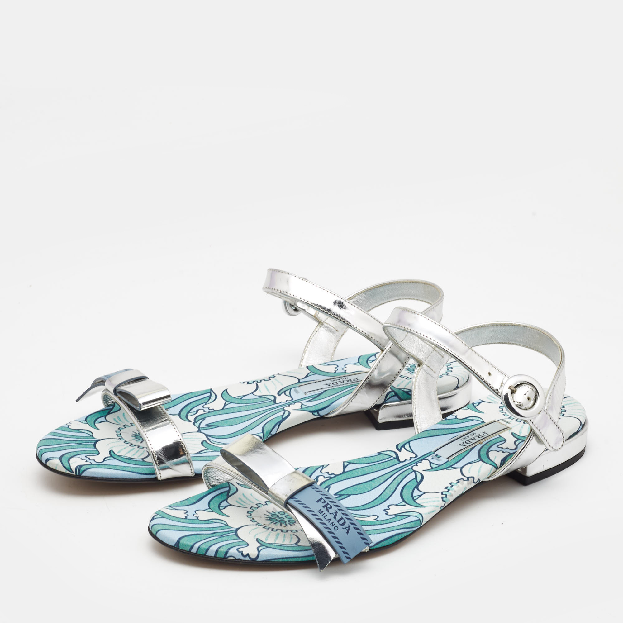 

Prada Silver Leather Floral Print Ankle Strap Flat Sandals Size