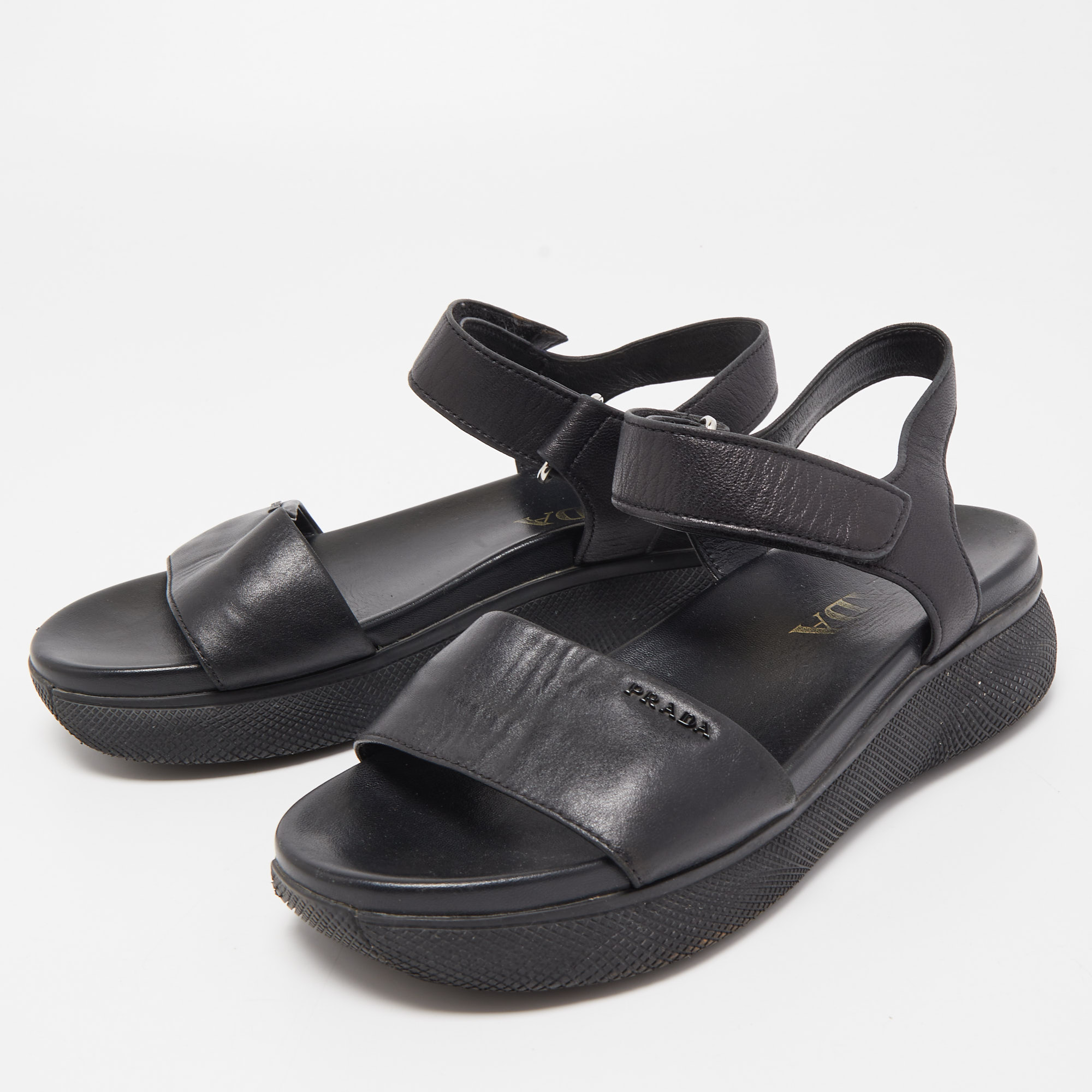 

Prada Black Leather Ankle Strap Flat Sandals Size