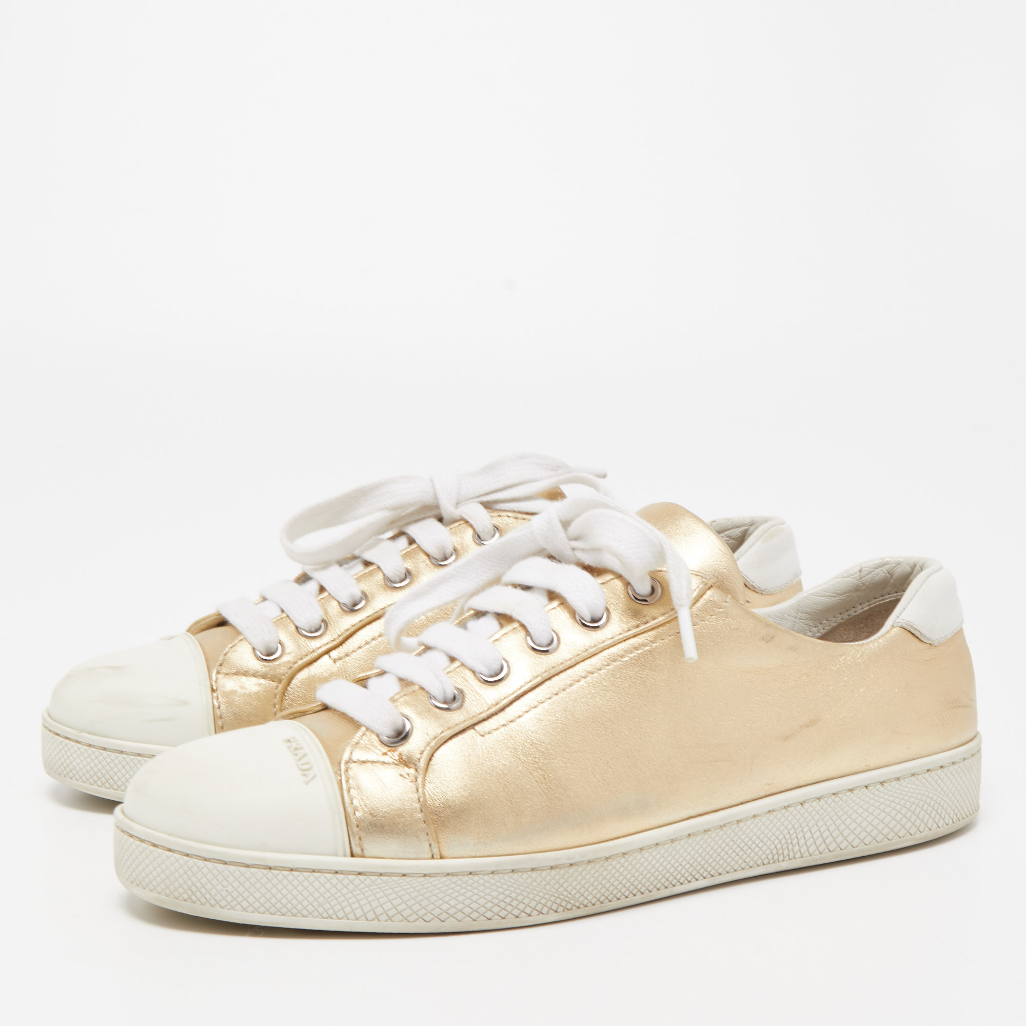 

Prada Gold/White Leather and Rubber Low Top Sneakers Size