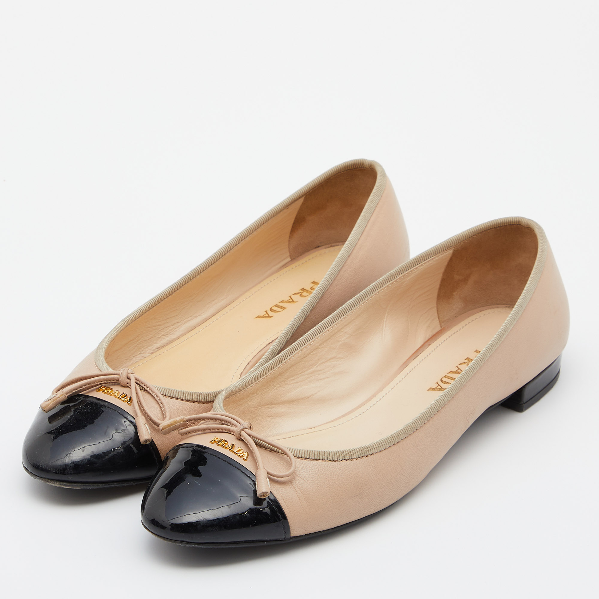 

Prada Beige/Black Patent and Leather Cap Toe Bow Ballet Flats Size