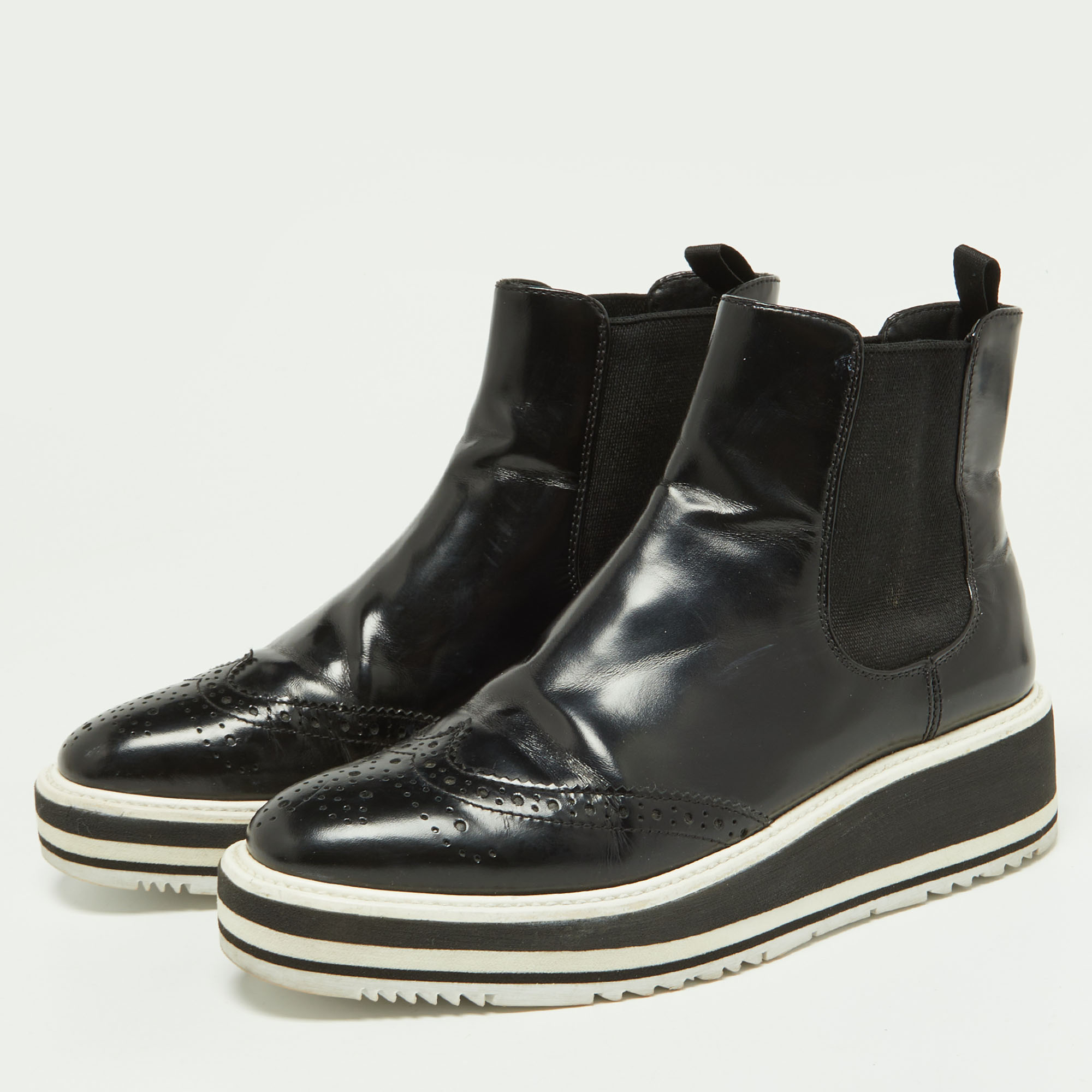 

Prada Black Patent Leather Micro Sole Wing Tip Chelsea Boots Size
