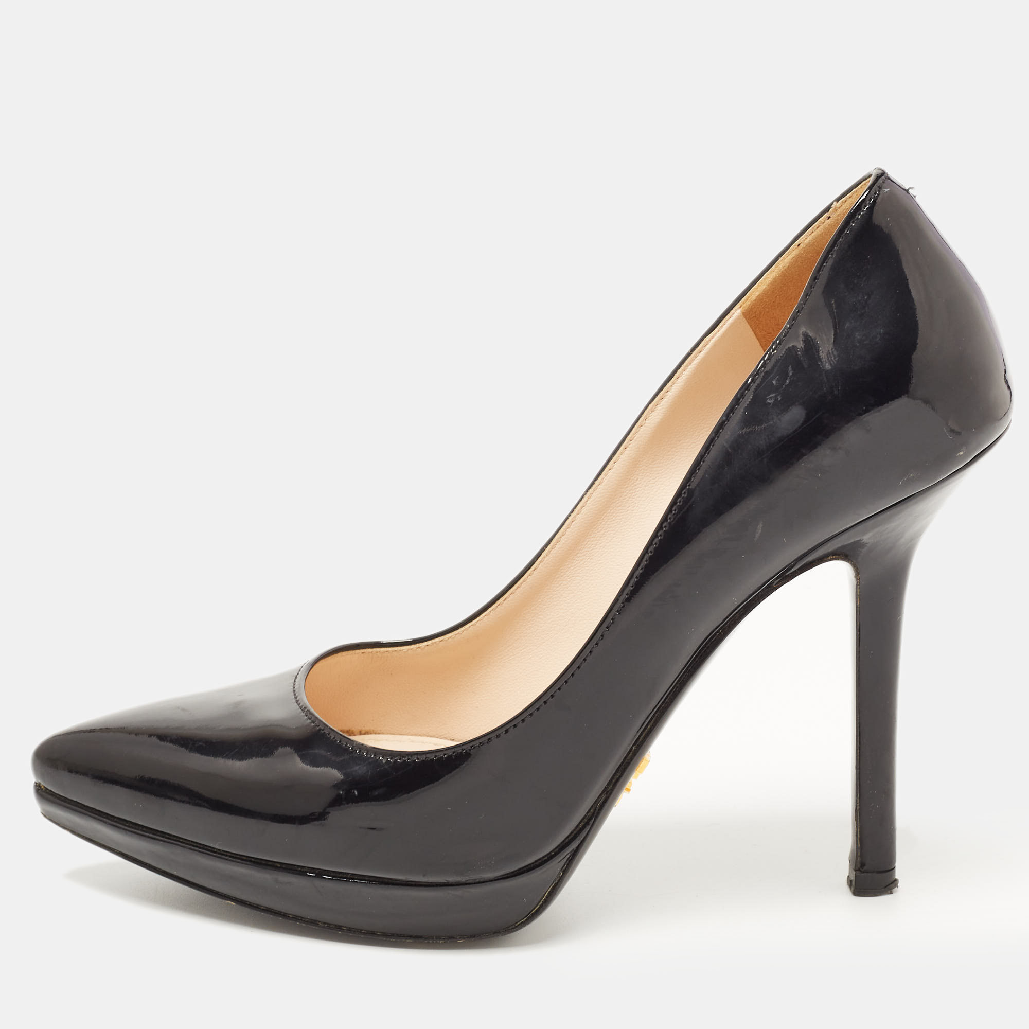Exhibit an elegant style with this pair of pumps. These Prada shoes for women are crafted from quality materials. They are set on durable soles and sleek heels.