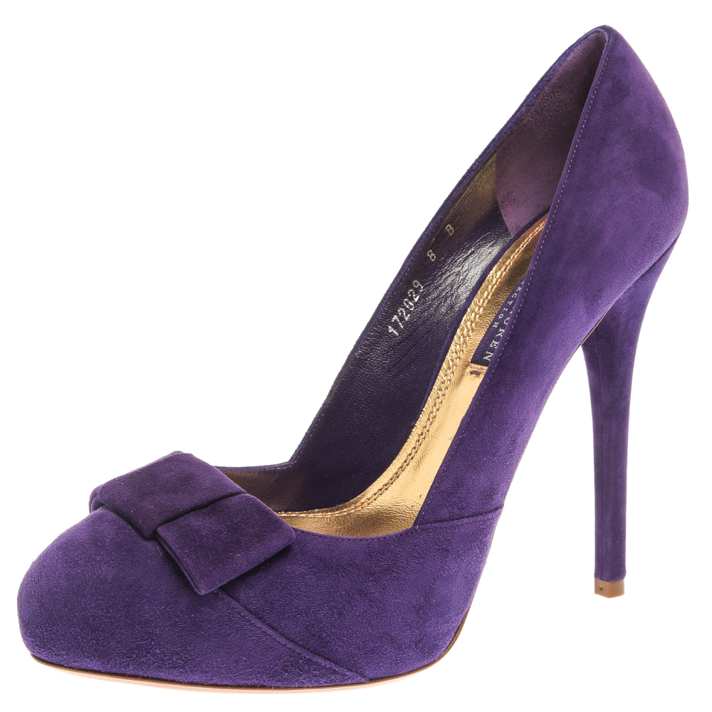 Crafted with smooth and luxurious suede these pumps are versatile and a wardrobe classic. With this pair Ralph Lauren brings to you one of their best designs that reflect the trends for the season. Revamp your collection of footwear with this pair of high heeled purple pumps.