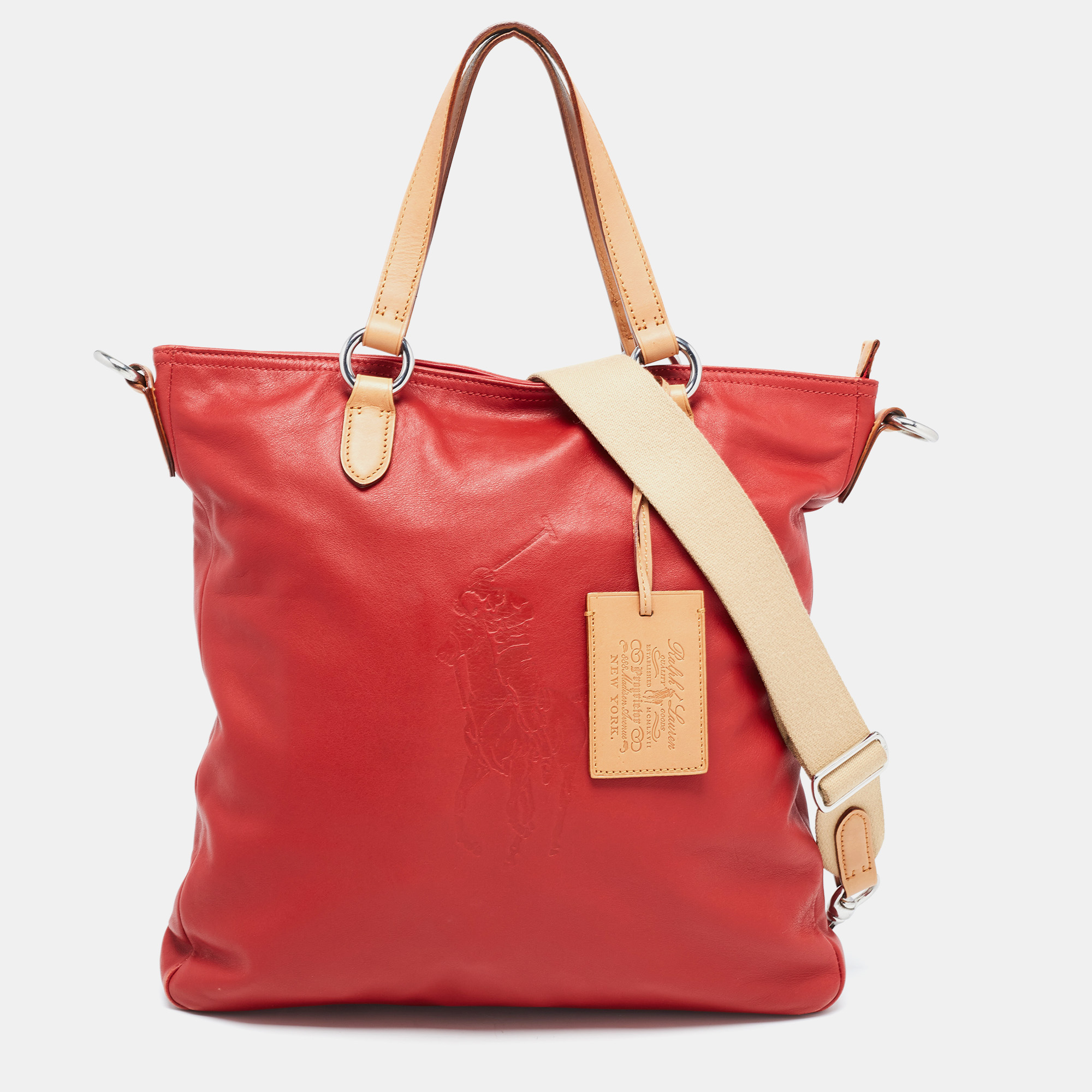 When you carry this Ralph Lauren creation be ready to catch admiring glances as this tote is stylish and functional. The bag has been crafted from leather and designed with buckles. It is equipped with two handles and a very spacious canvas and leather interior.