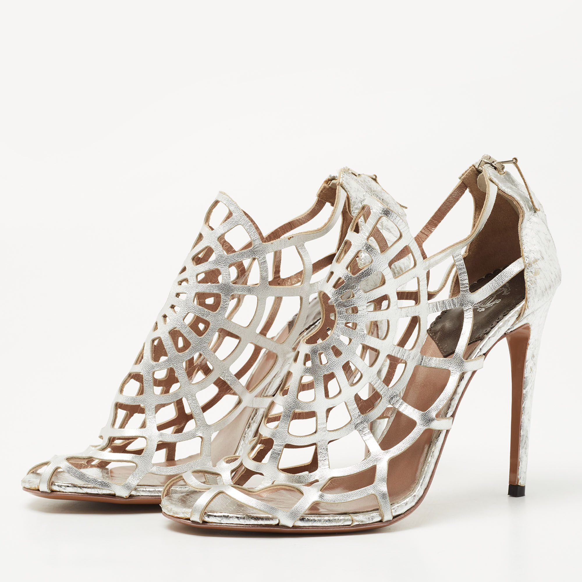 

Roberto Cavalli Silver Cutout Leather Spider Web Cage Booties Size