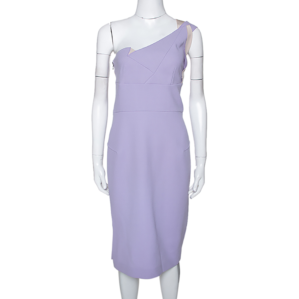 This lavender dress is from Roland Mouret. This dress wins with its feminine design of the one shoulder cut the folded panels and the fitted silhouette. The full zipper on the side in gold tone helps you easily slip into the dress.