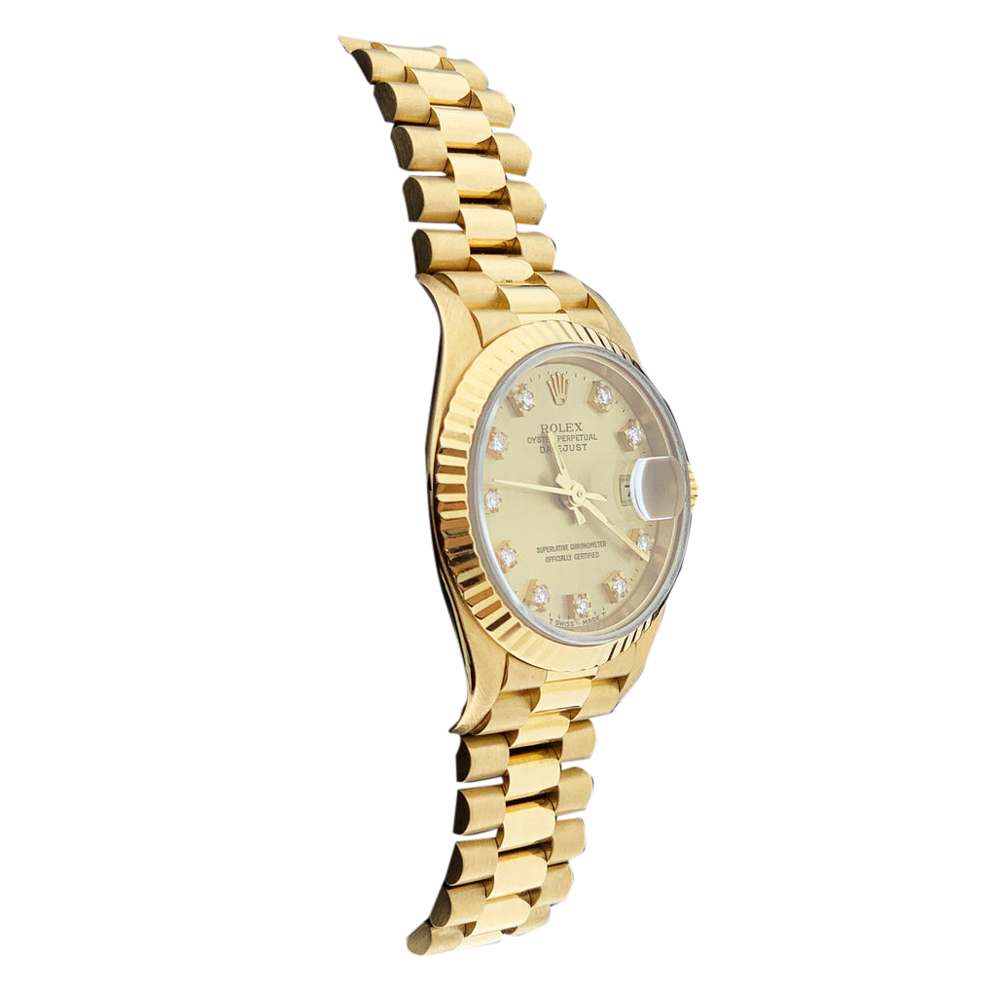 

Rolex Champagne Diamonds 18K Yellow Gold Datejust 69178 Women's Wristwatch 26 MM