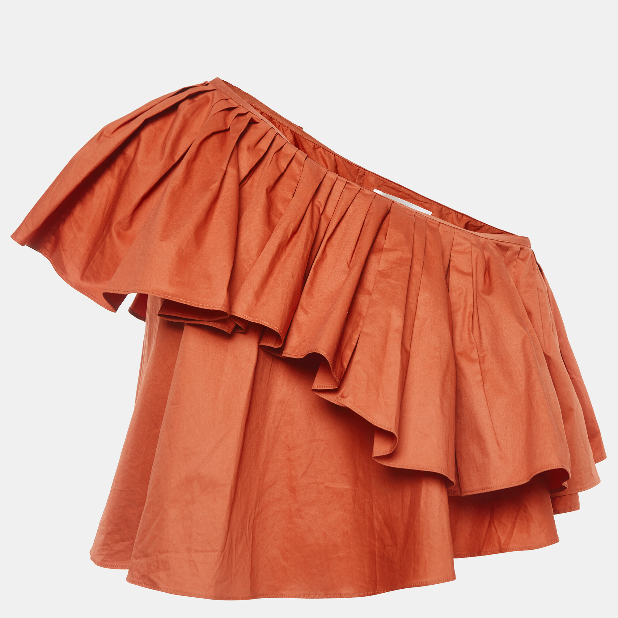 The Ronny Kobo top is a vibrant and stylish piece featuring a single shoulder design with playful ruffles. Made from high quality cotton it offers a comfortable fit and a bold eye catching orange hue making it a perfect choice for a chic and fashionable look.