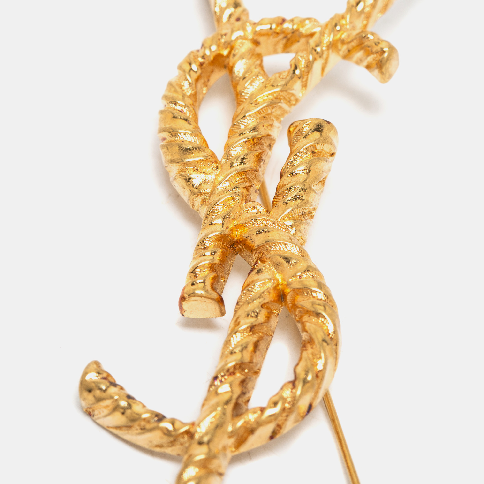 

Saint Laurent Paris Gold Tone Opyum Twisted Pin Brooch