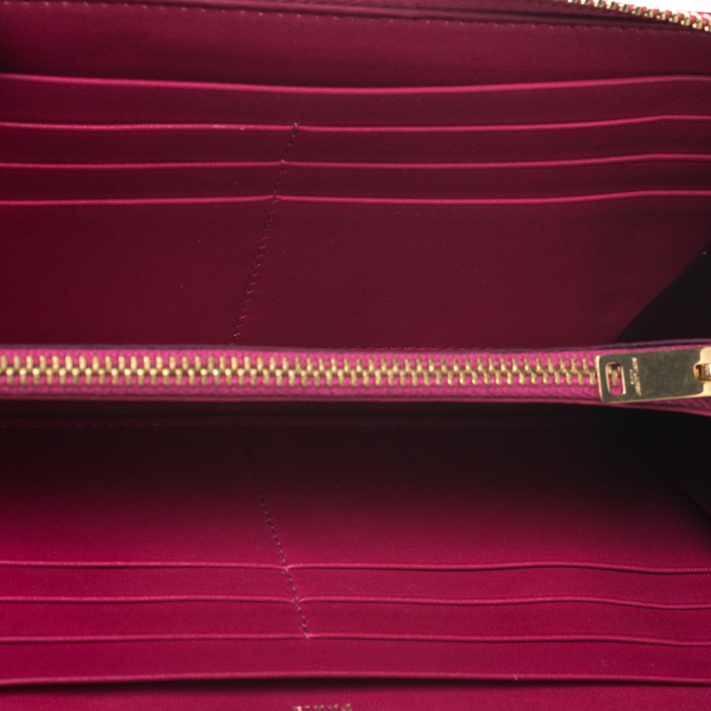

Saint Laurent Fuchsia Patent Leather Zip Around Wallet, Pink