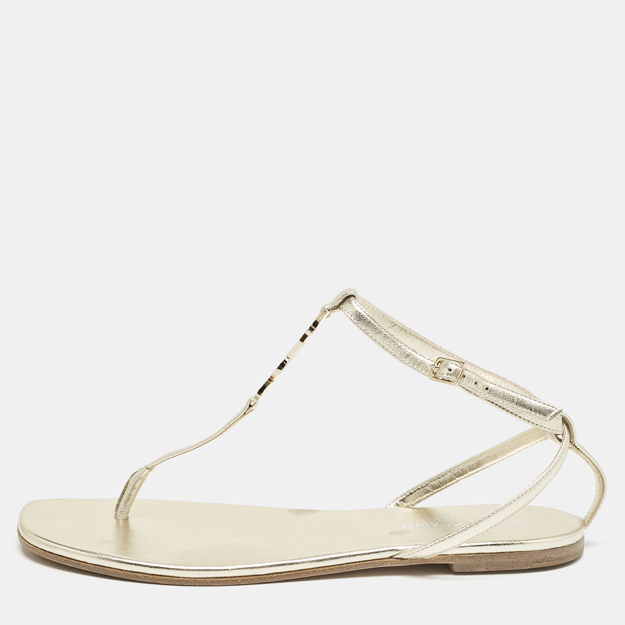 

Saint Laurent Gold Leather Cassandra Thong Flat Sandals Size