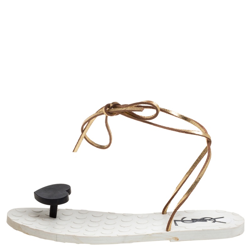 

Saint Laurent Paris Gold Leather And Rubber Heart Thong Ankle Wrap Flat Sandals Size, White