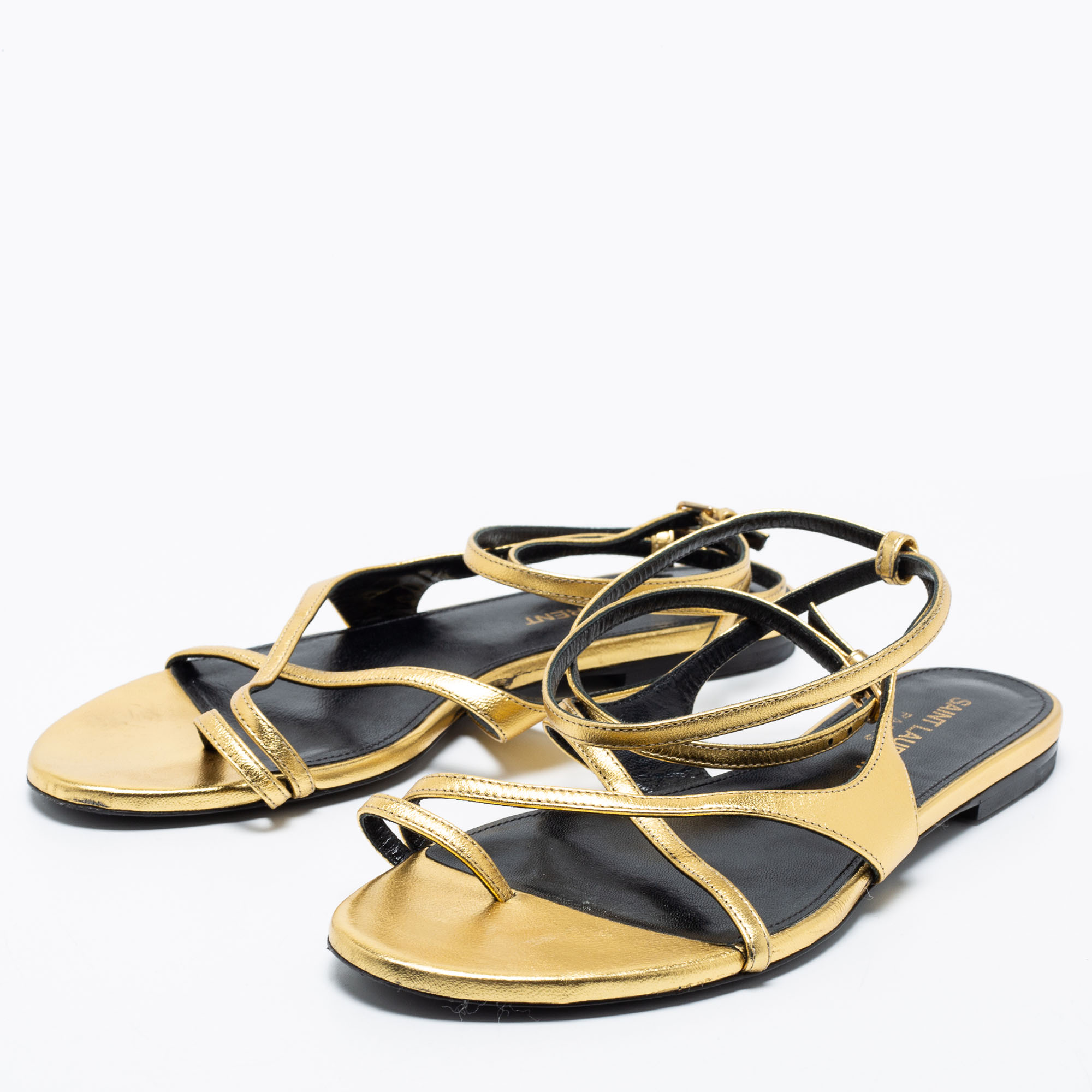 

Saint Laurent Gold Leather Strappy Ankle Wrap Flat Sandals Size