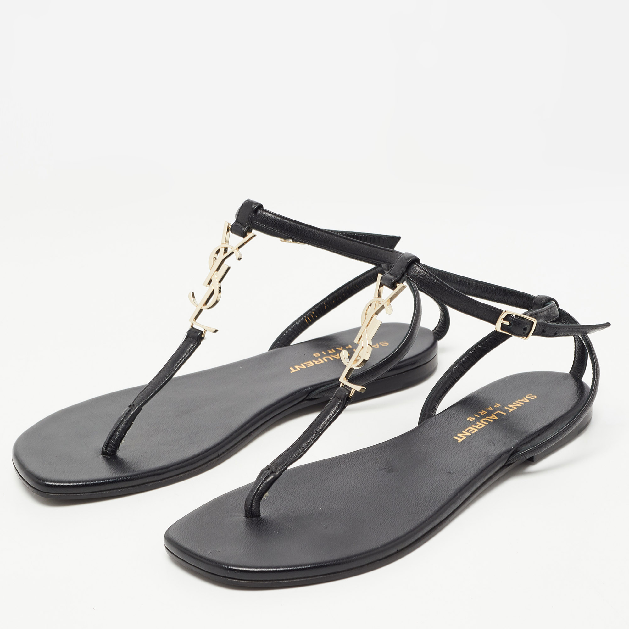

Saint Laurent Black Leather Logo T Bar Ankle Strap Flat Sandals Size