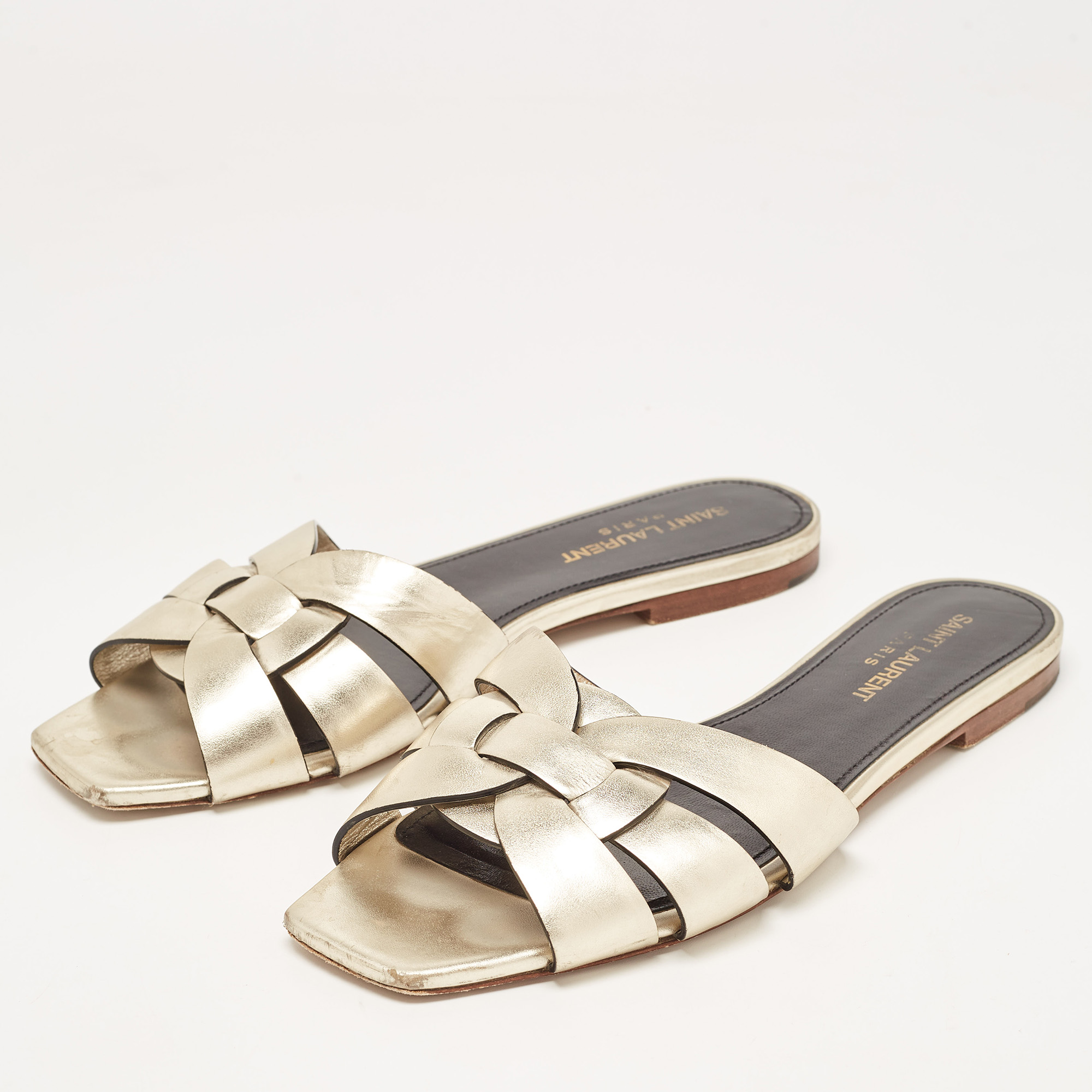 

Saint Laurent Gold Leather Tribute Flat Slides Size