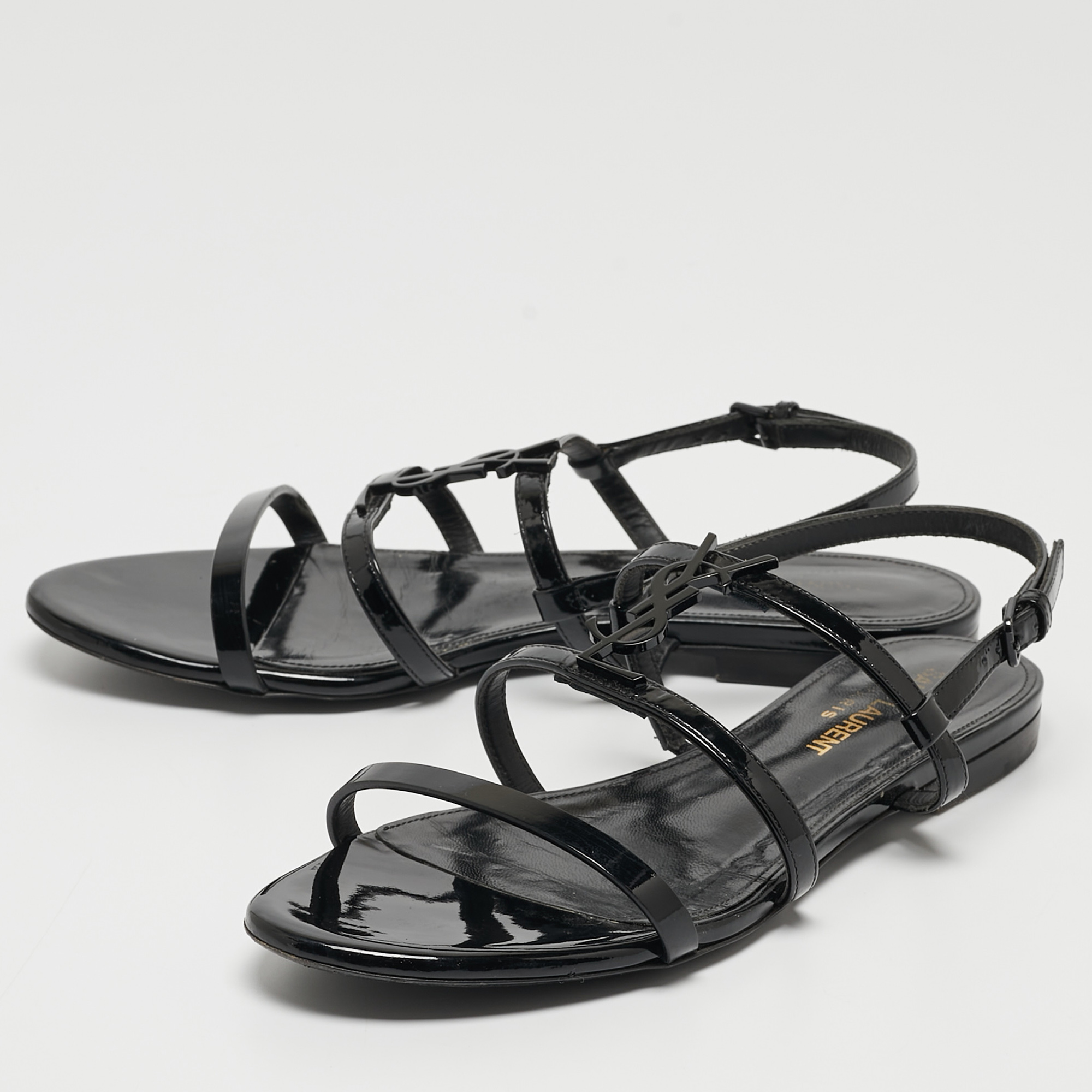 

Saint Laurent Black Patent Leather Cassandra Flat Sandals Size