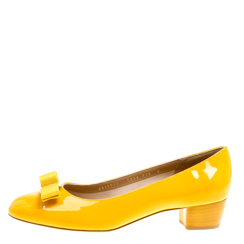

Salvatore Ferragamo Mustard Patent Leather Vara Bow Block Heel Pumps Size, Yellow