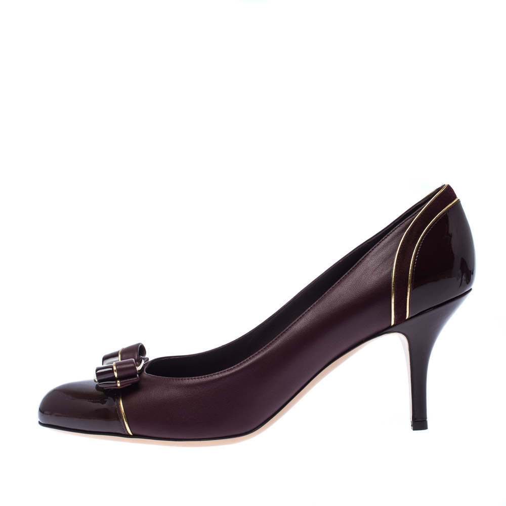 

Salvatore Ferragamo Burgundy Patent Leather Carla Vara Bow Pumps Size