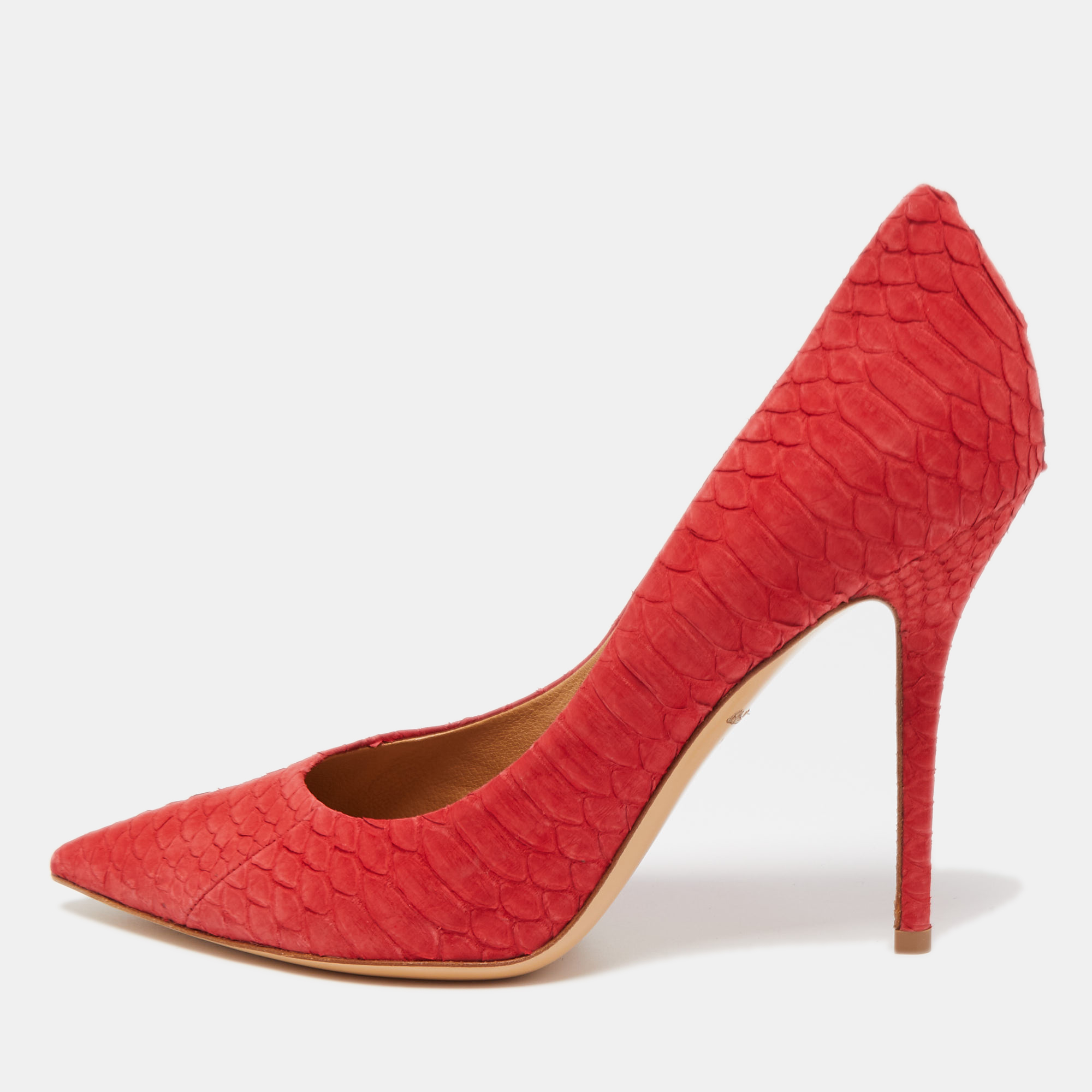 The Salvatore Ferragamo pumps are luxurious and stylish womens shoes. Crafted with red python skin they feature a pointed toe design and a slim stiletto heel exuding timeless elegance and sophistication.
